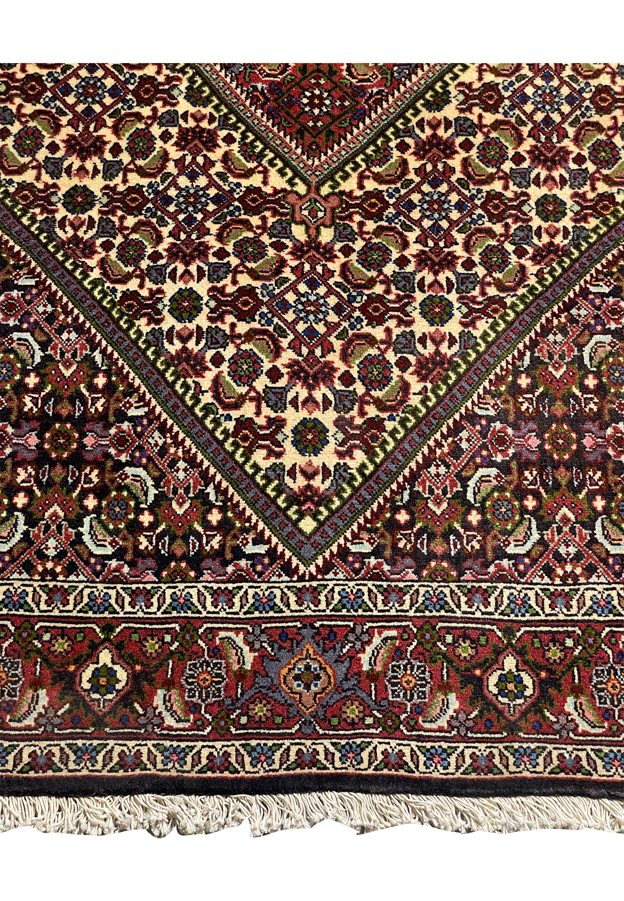 Close-up of the fringe and edge of a Persian Bijar rug, demonstrating the craftsmanship and durability.
