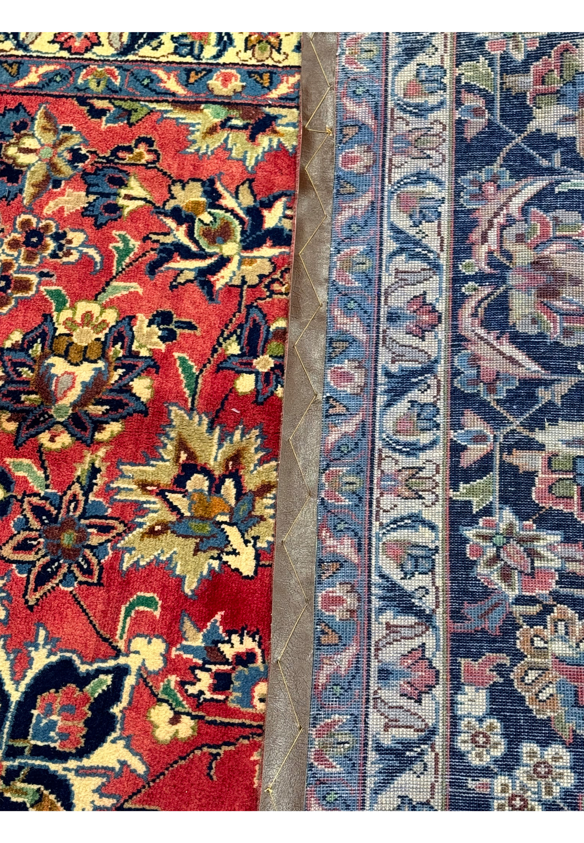 10'2 x 13'7 Persian Isfahan folder to show the backside of this high quality rug