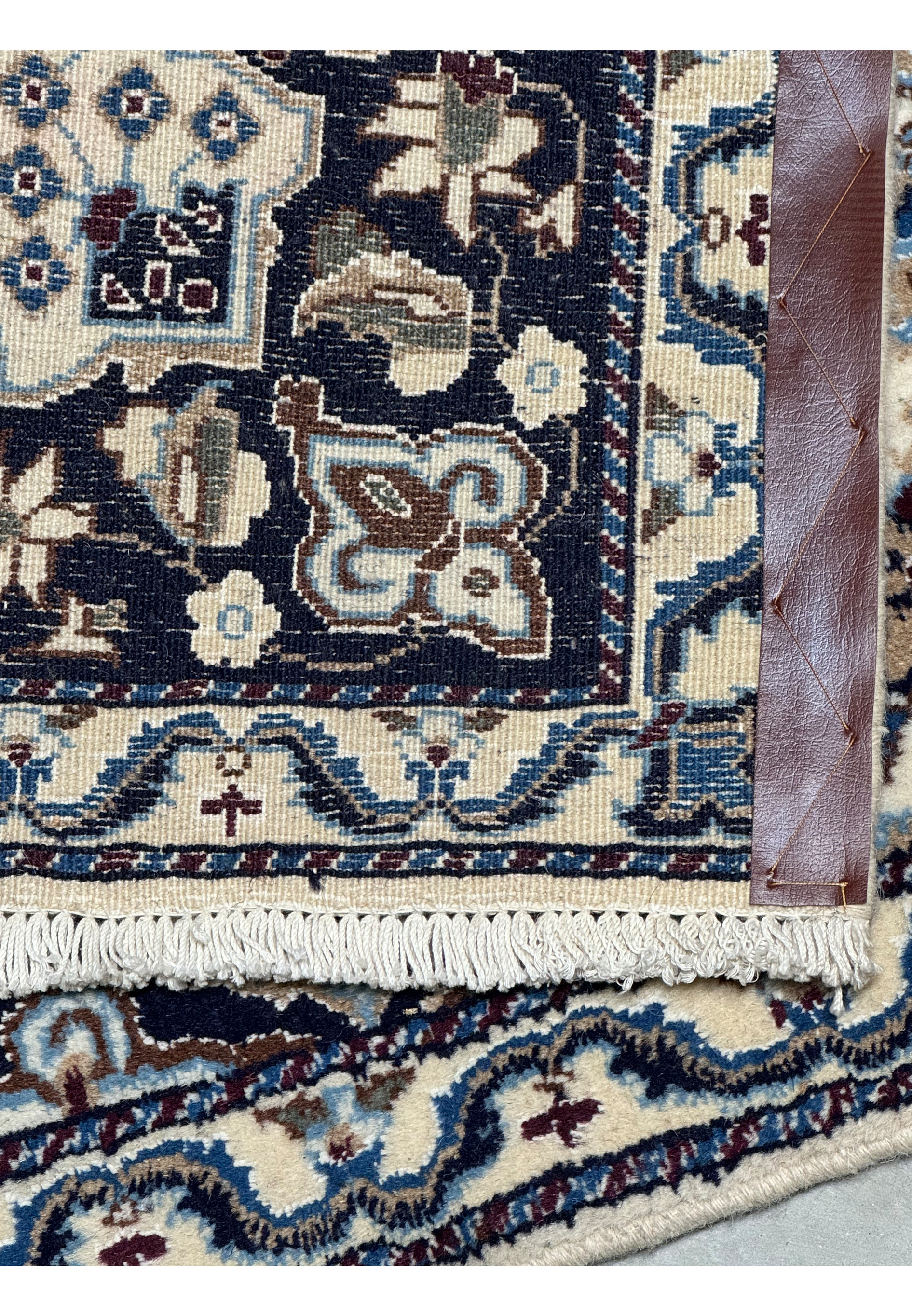 Back view of a 3 x 4'5 Nain Persian Rug highlighting craftsmanship.