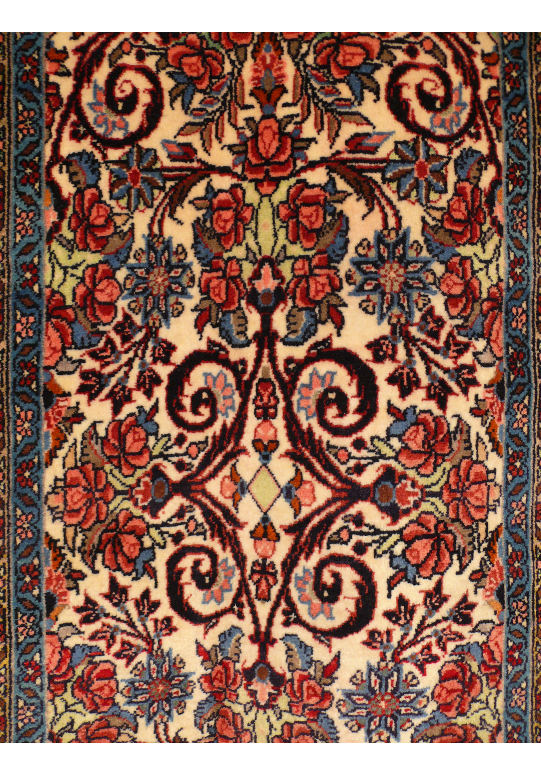 Detailed view of the medallion and floral motifs on the 2'6 x 6 Persian Bijar Runner.
