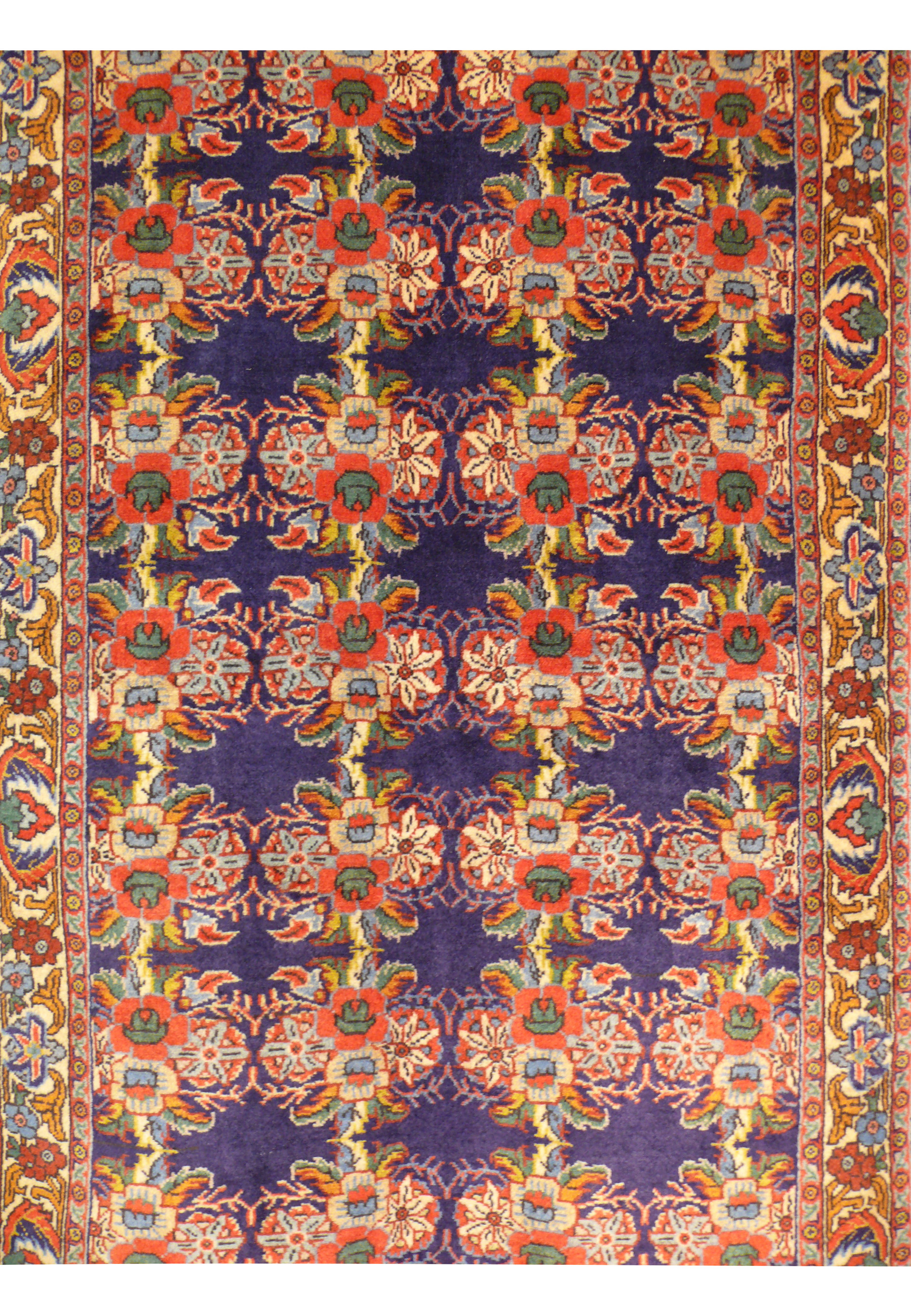 Midfield view of 2'6 x 7 Persian Bijar Runner displaying the central lattice of floral motifs.