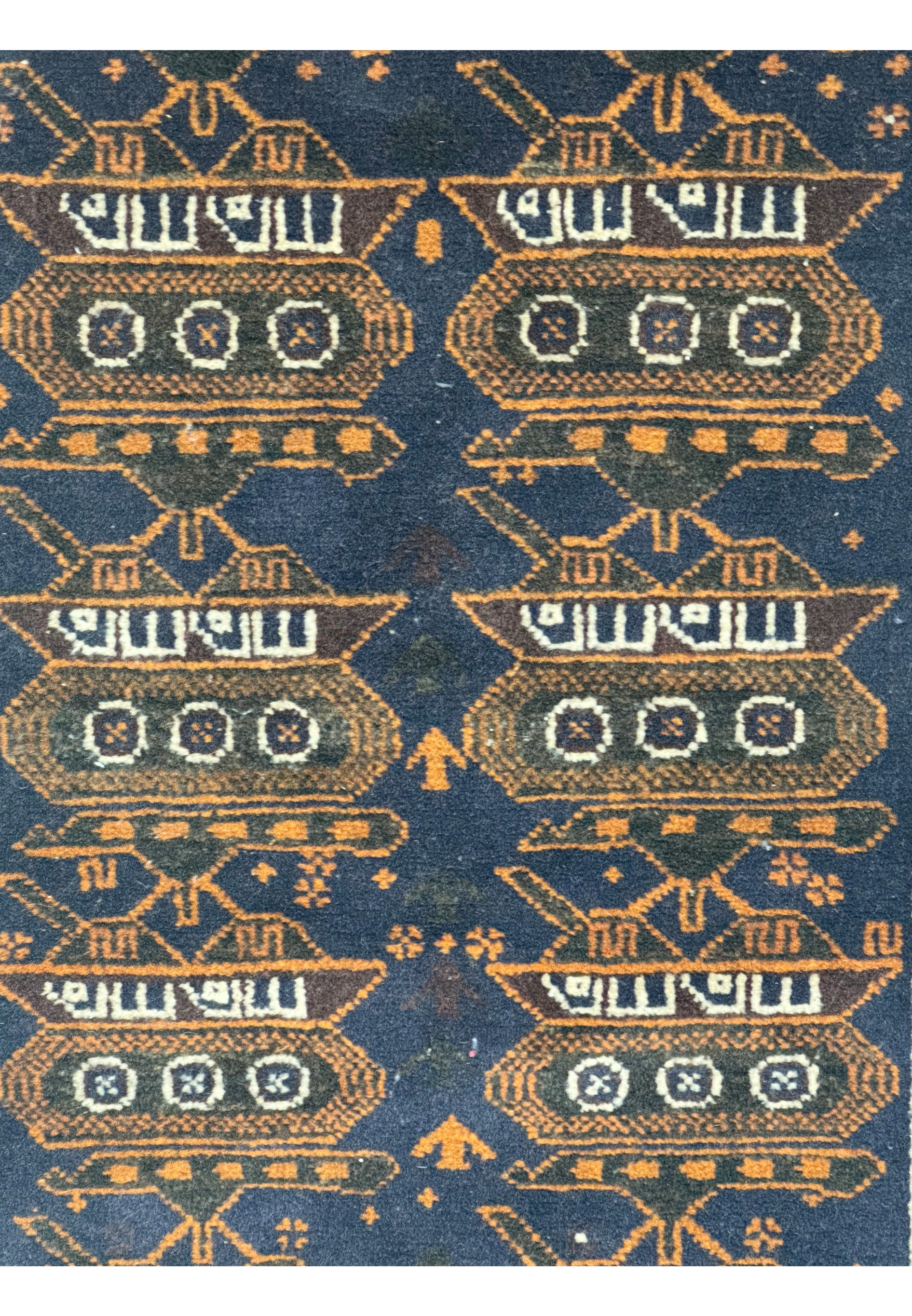 Zoomed-in view of the tank motifs on the midfield of a 2'9 x 4'4 Persian Baluch Rug.