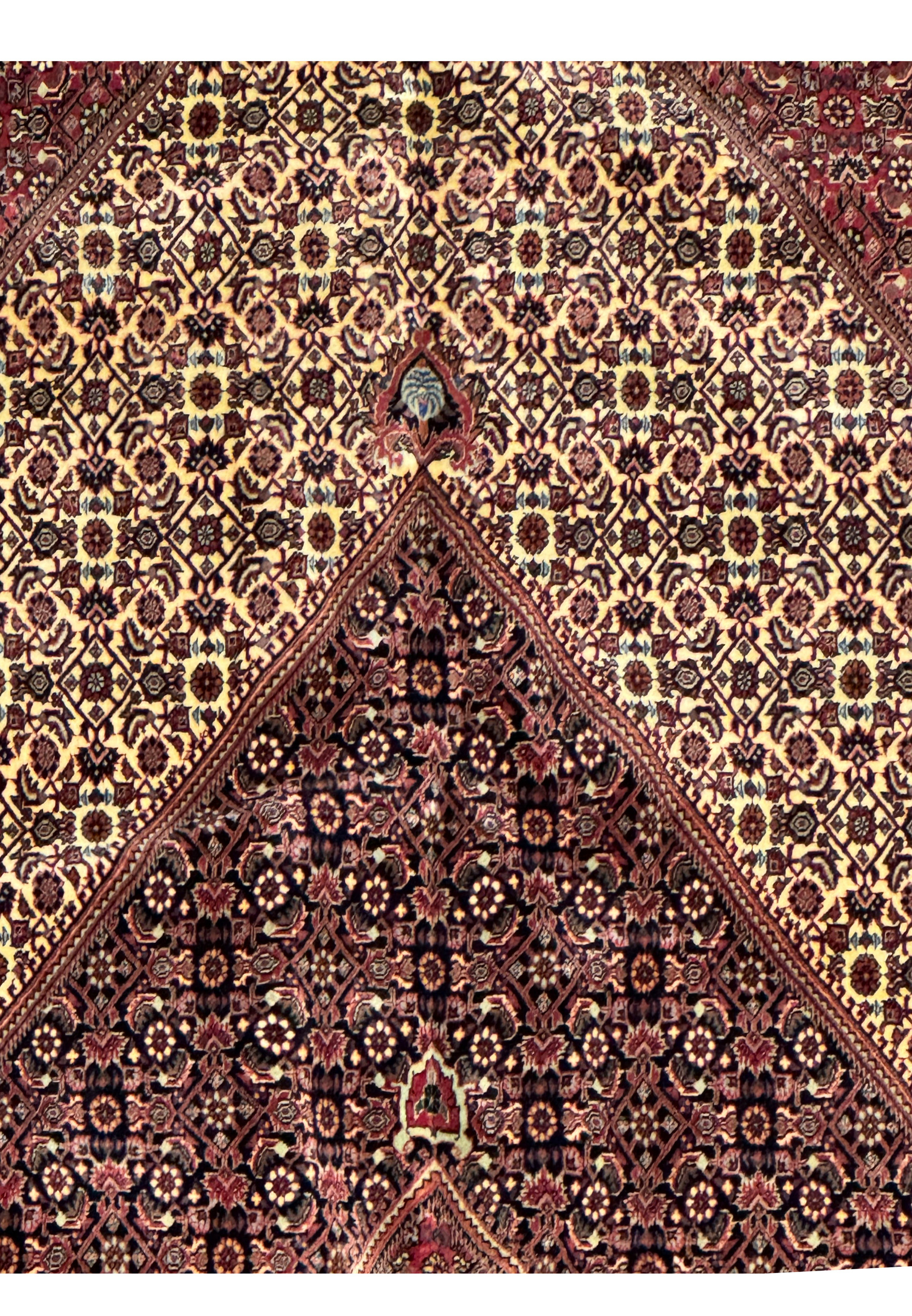 Midfield section of 13 x 20 Persian Bijar Rug with dense floral pattern and rich color palette.