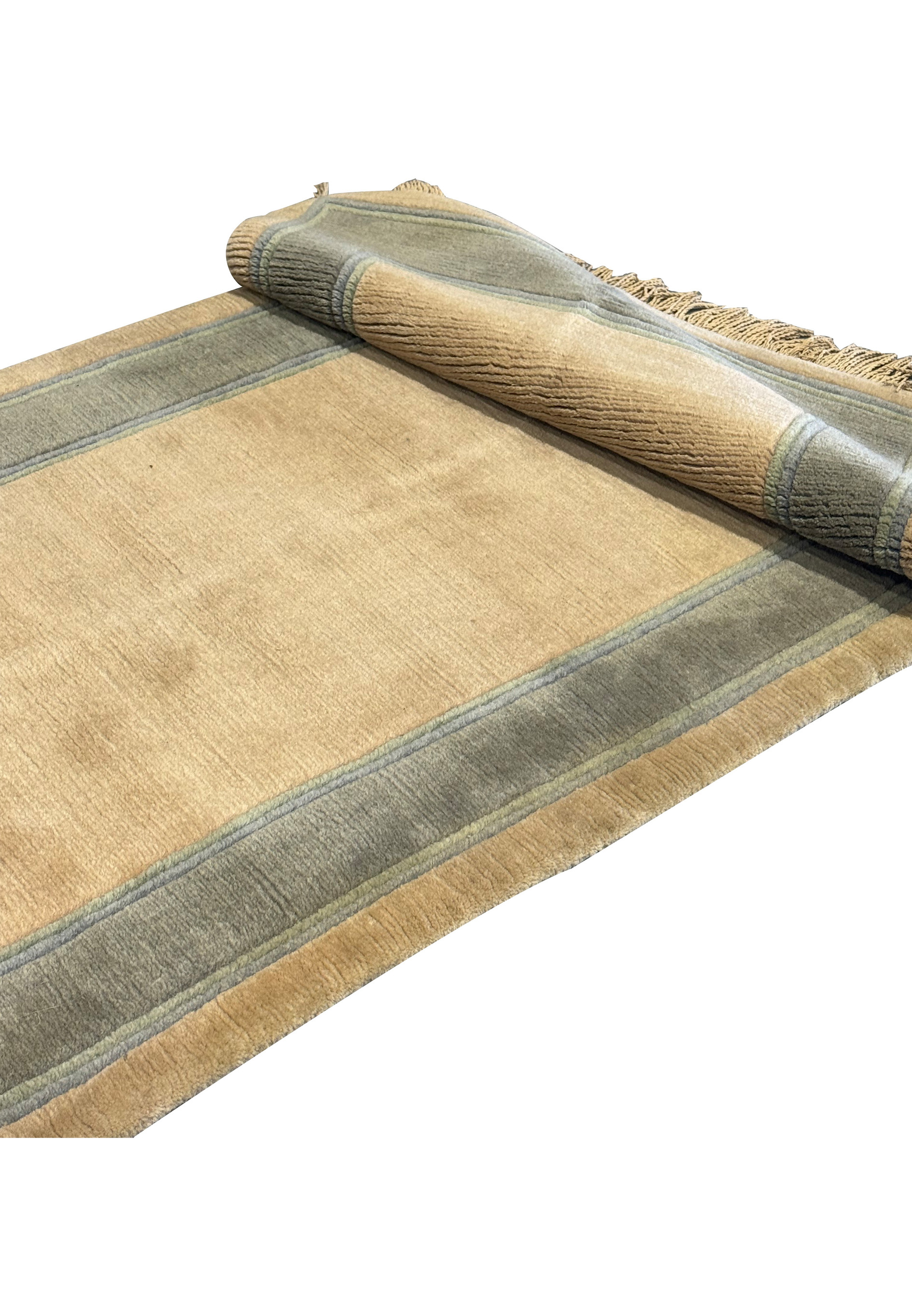 Rolled texture detail of a 2'8" x 28' Nepali runner showing fabric quality.