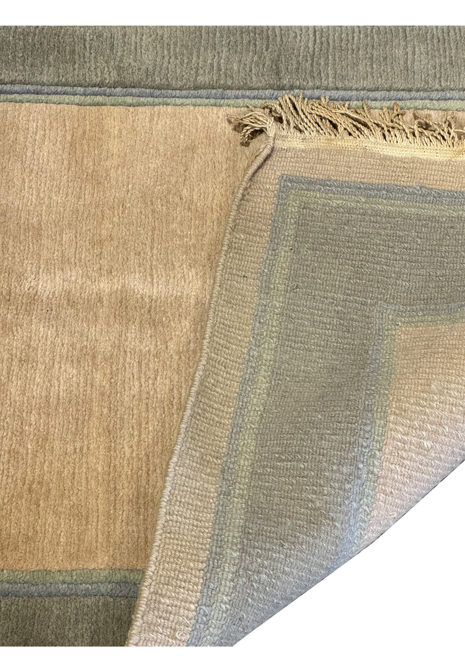 Folded backside of 2'8" x 28' Nepali runner, displaying reverse craftsmanship.