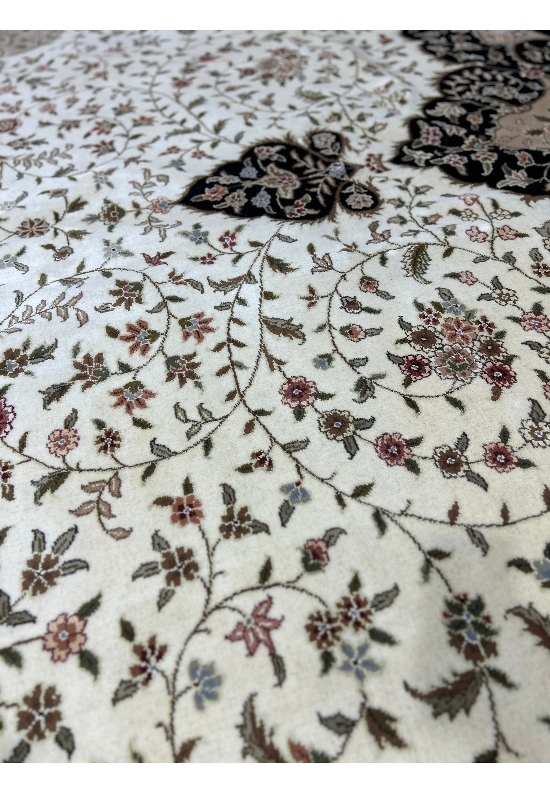 Intricate patterns of a 12'5" x 18' Persian Tabriz Rug, featuring classic motifs that enhance its historic allure.