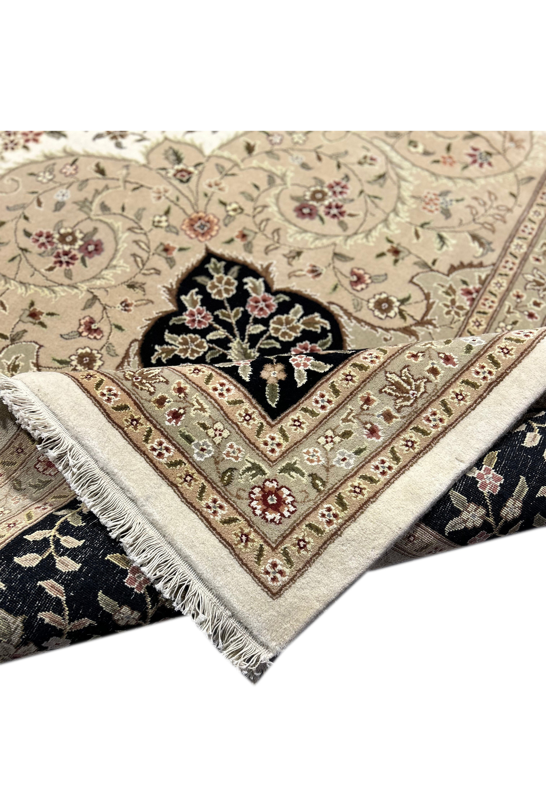 Detailed texture view of a 12'5" x 18' Persian Tabriz Rug, highlighting its intricate weave and quality material.