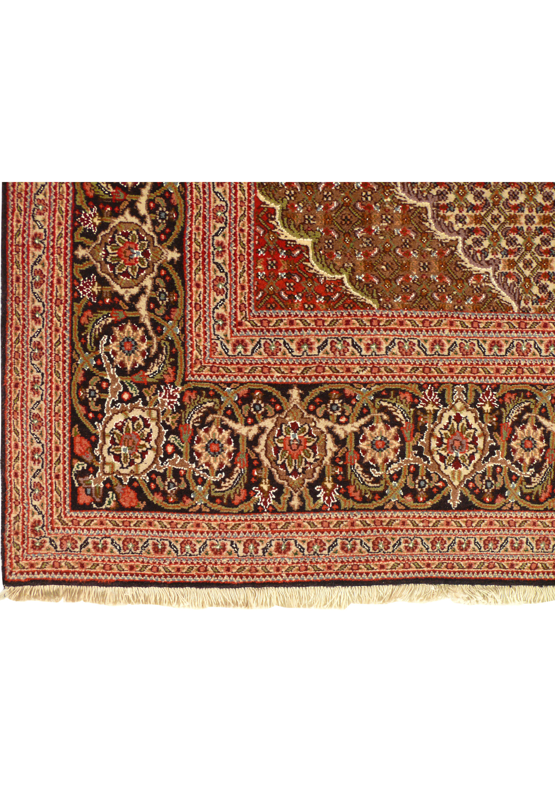 Detailed view of the border pattern on a 6'6 x 10'3 Persian Tabriz Mahi rug.