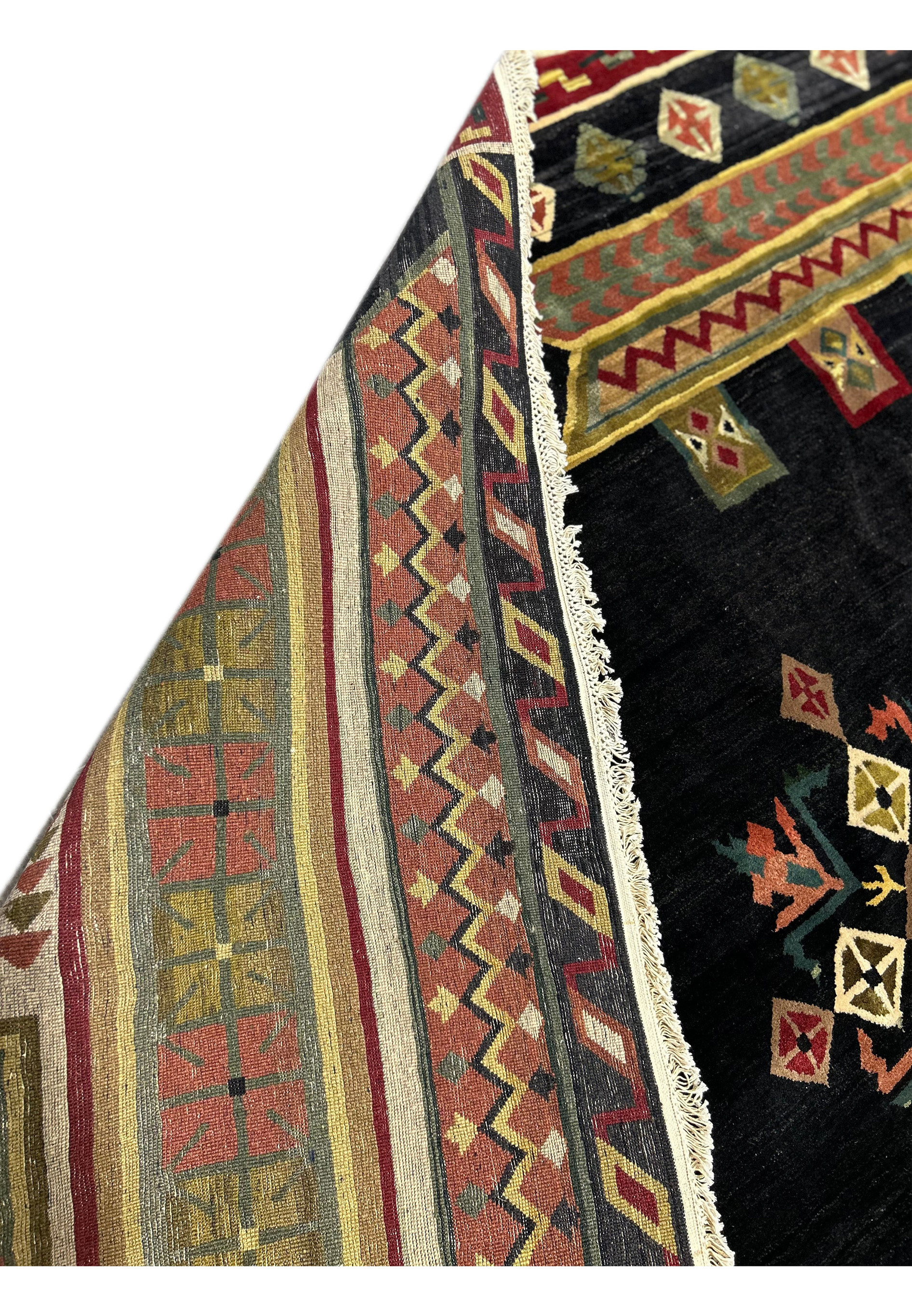 Close-up view of the backside of a 11'9" x 14'4" Modern Tribal Gabbeh Rug, highlighting the detailed cotton foundation.