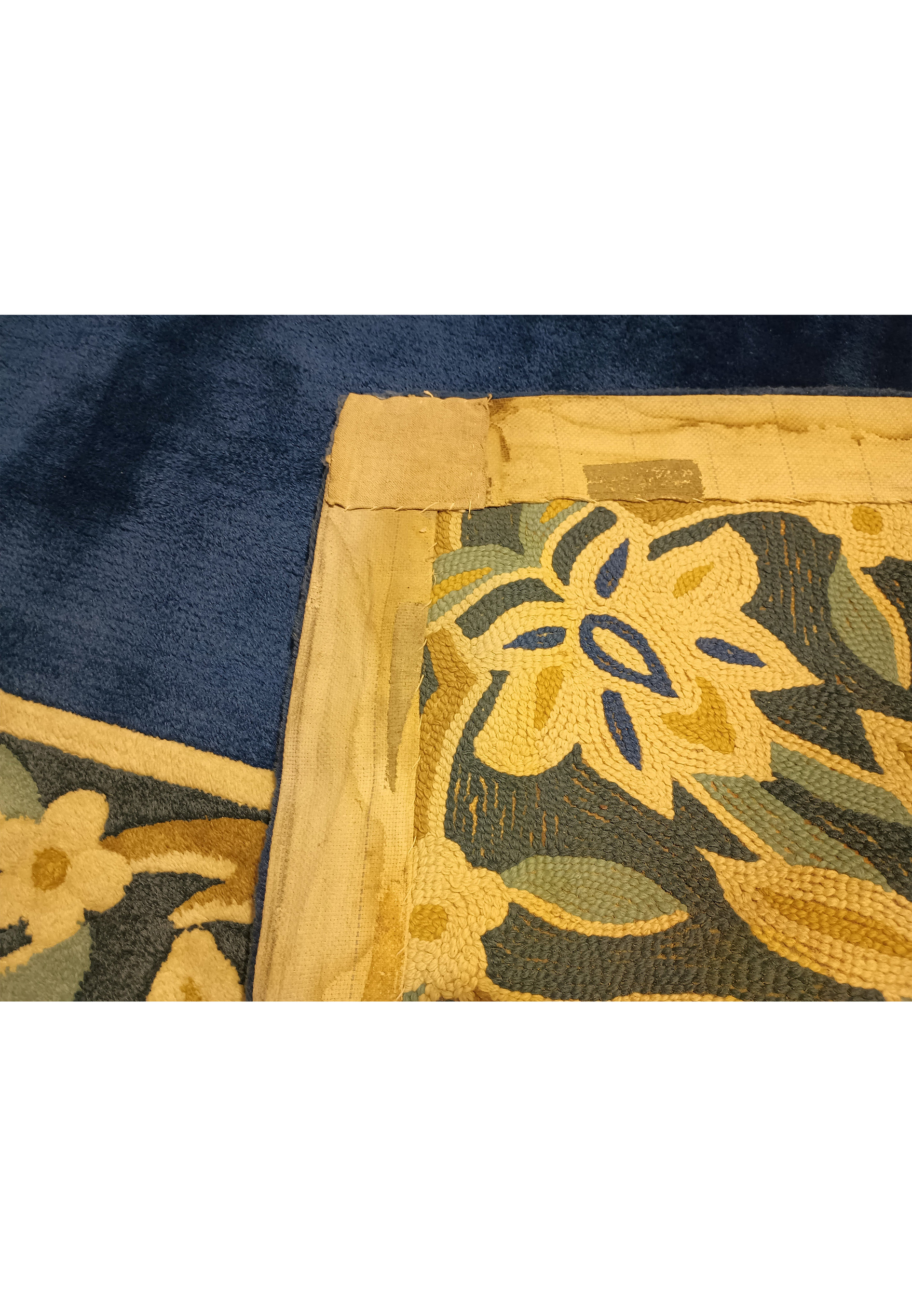 Backside of 11' x 30' French Rug showcasing the intricate weaving.