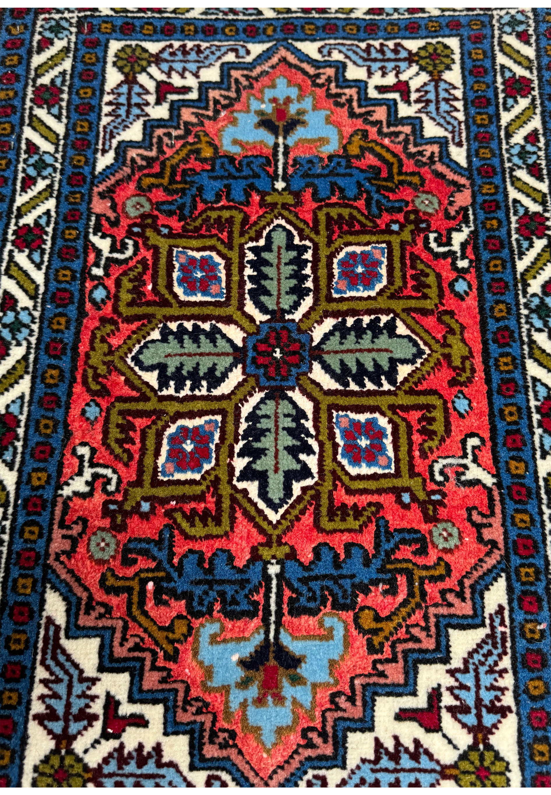 Close-up of the central medallion design on the Persian Ardebil Wool and Silk Poshti Rug.