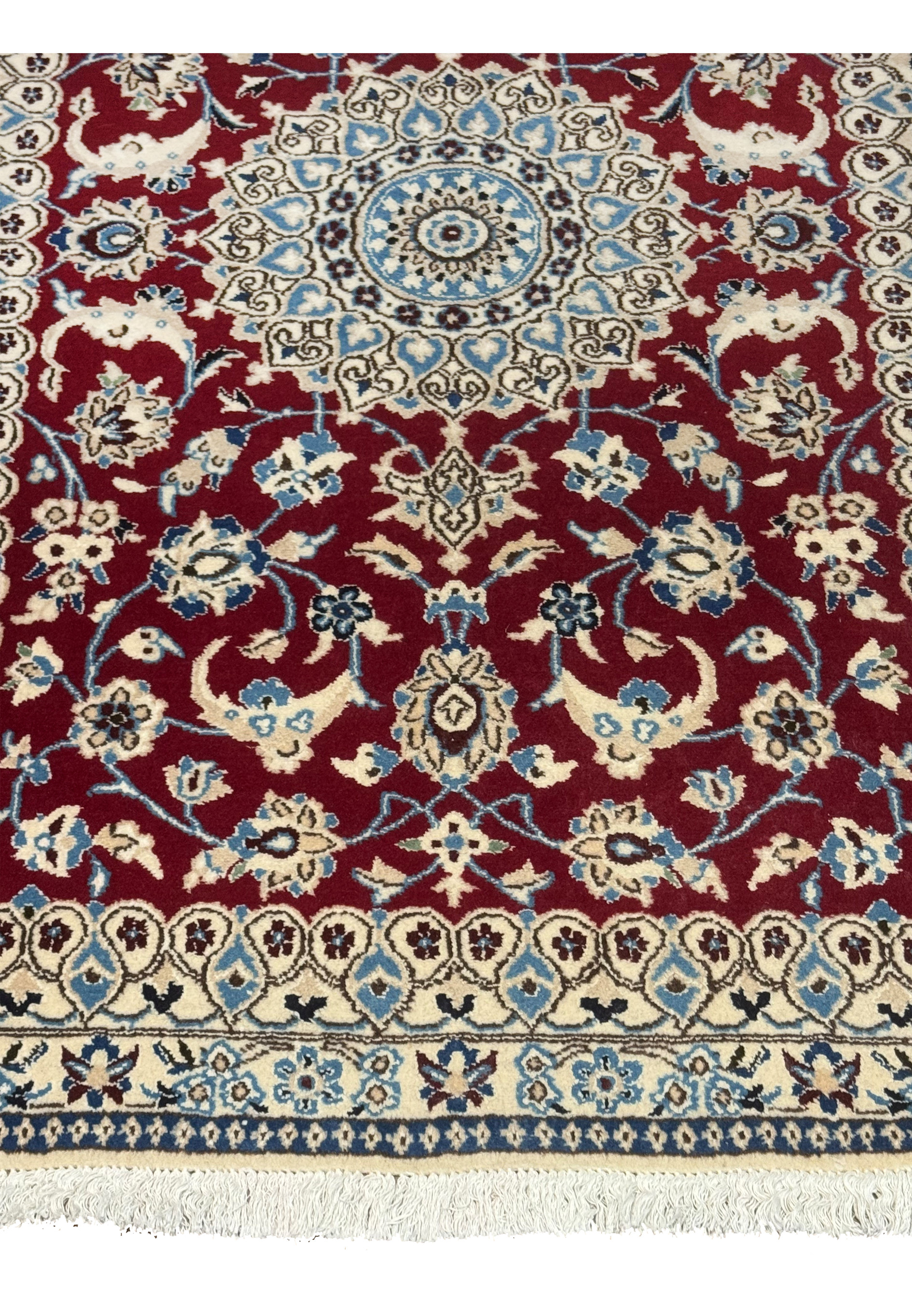 Lower floral border detail of Red Nain rug with vine scrolls