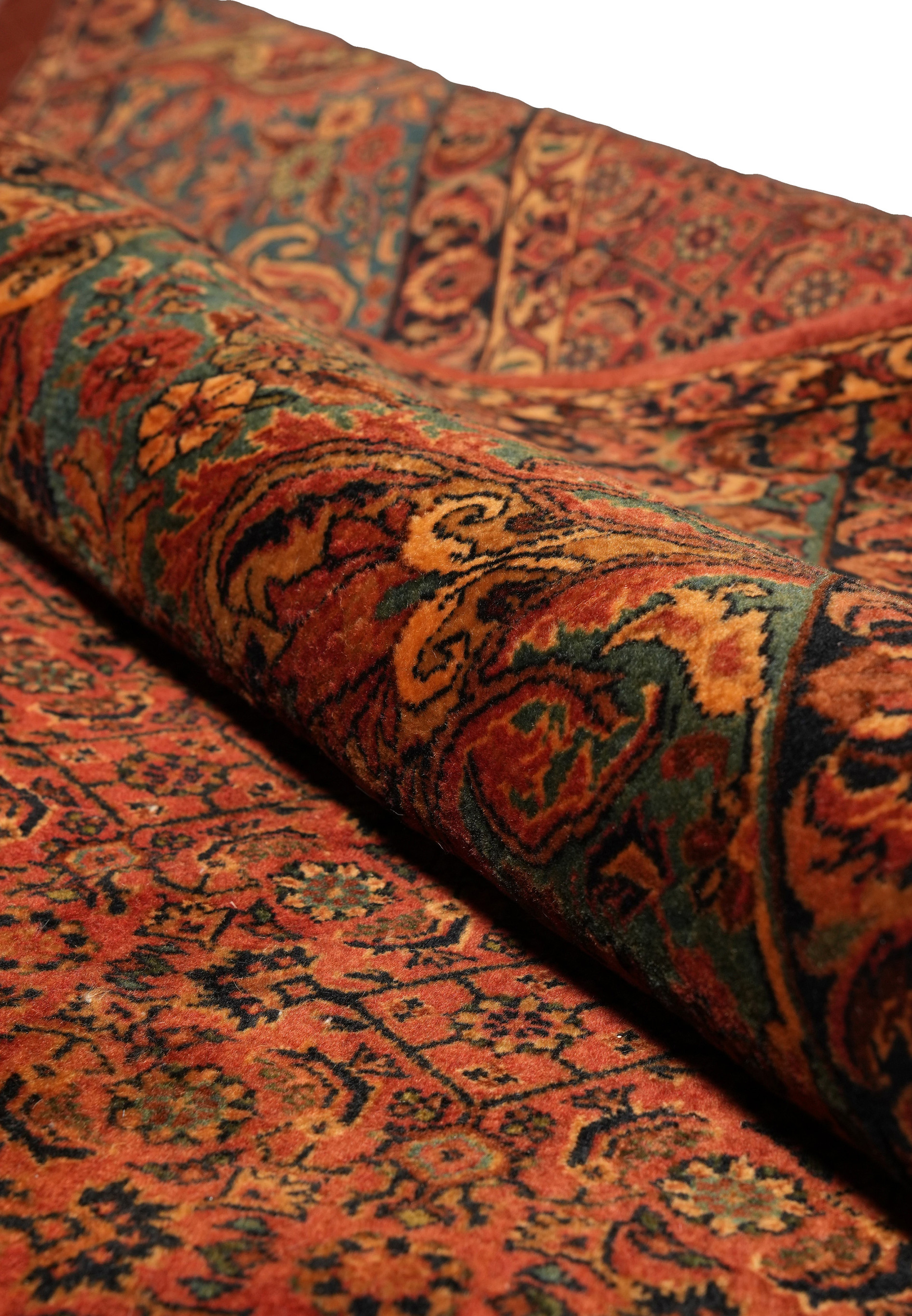Rolled wool close up of a rare bijar persian square rug 13x13
