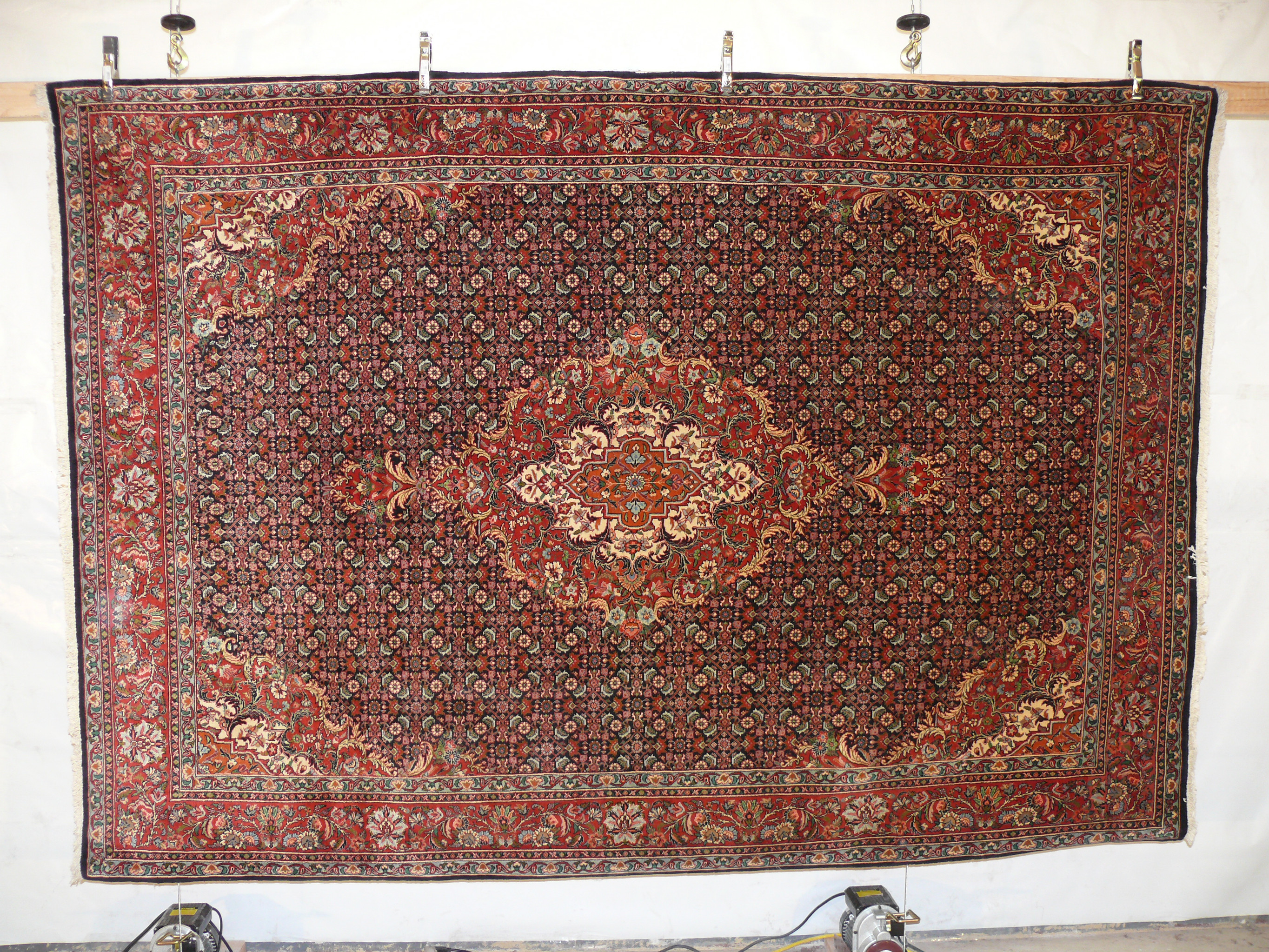 7 x 10 Bijar Persian Rug hanging and showing its whole beauty also call Iron Rug