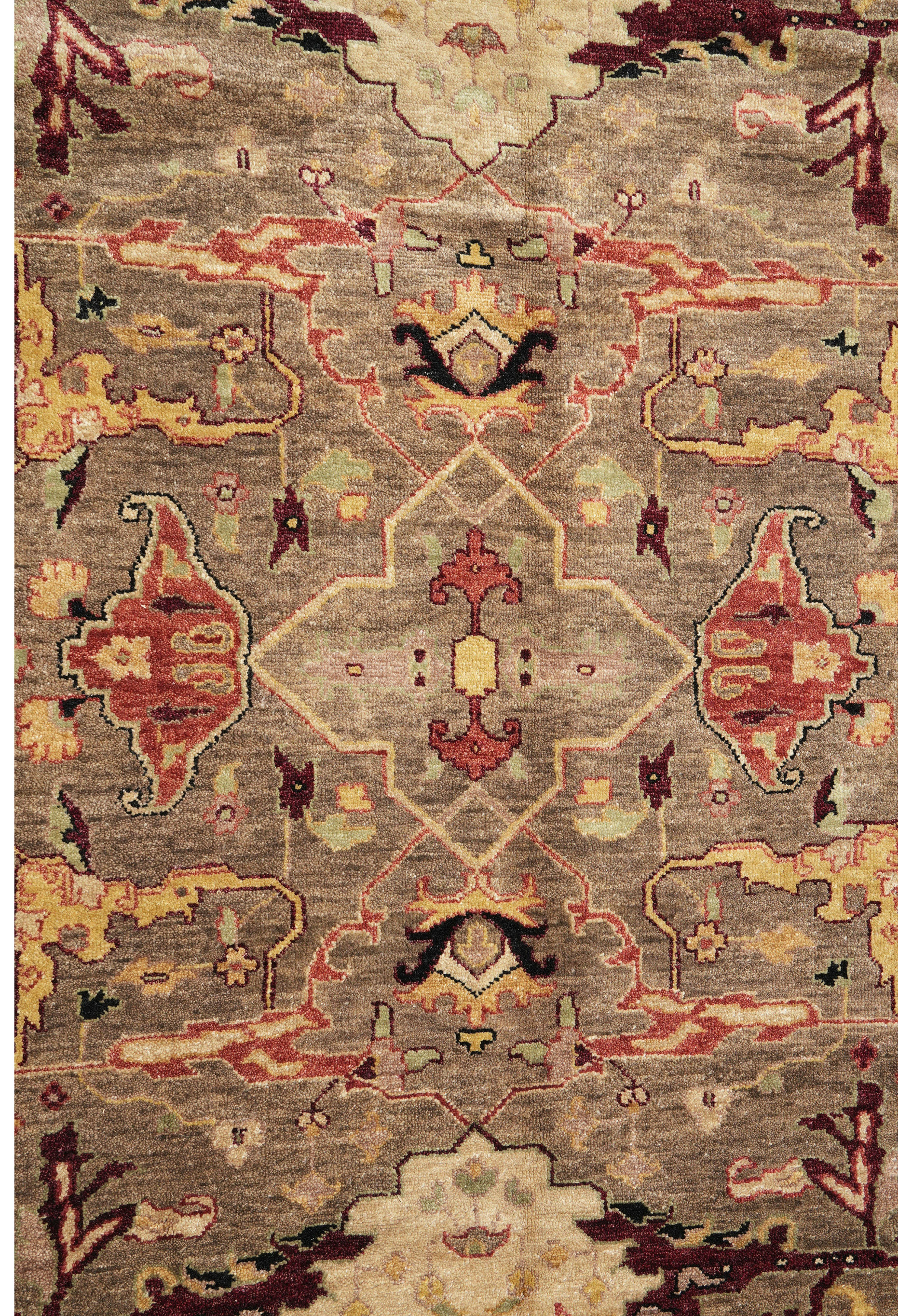 Close-up midfield design of Afghan Chobi Peshawar Rug with taupe and rust floral motifs