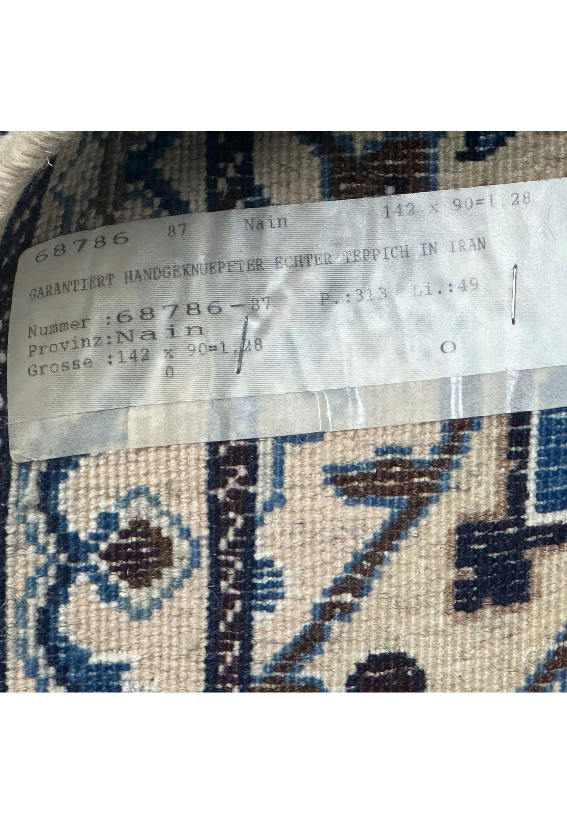 Backside and authenticity tag of 3 x 4'8 Navy Blue Nain Persian Rug from Iran