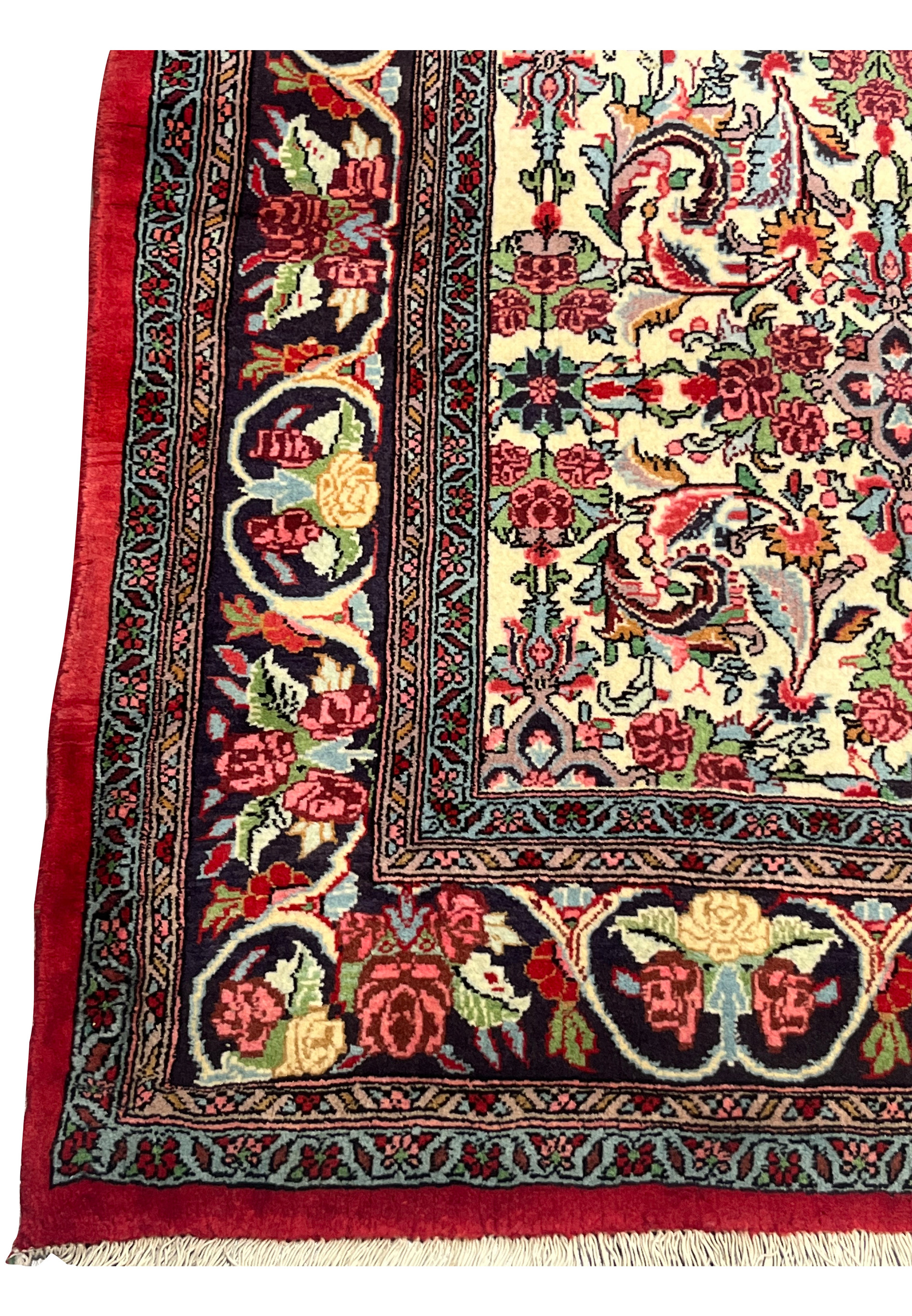 Close-up of navy floral border with roses and cartouches on Bijar Halvaie Rug