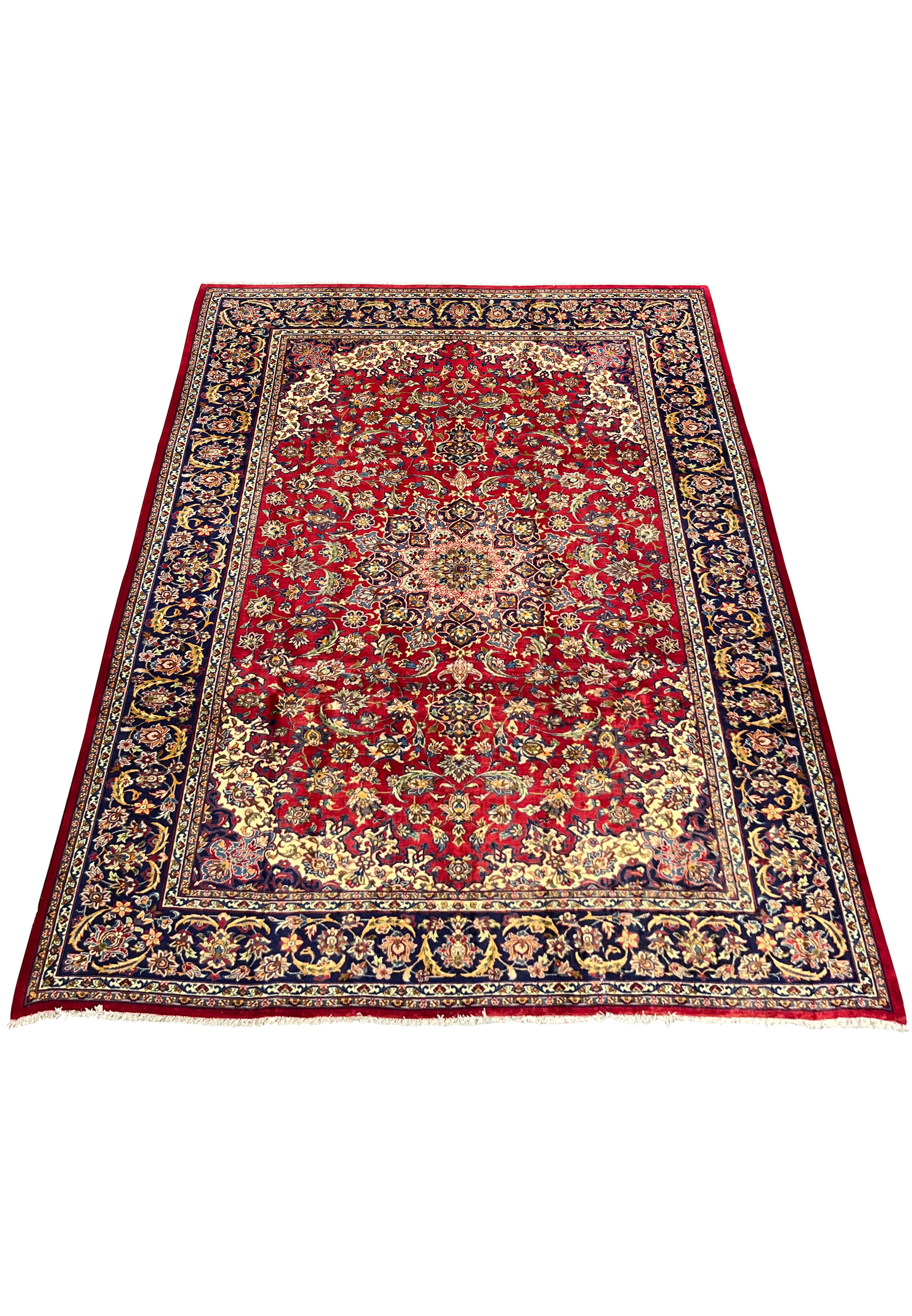 Laid-down angle of Persian Isfahan rug showing detailed medallion pattern