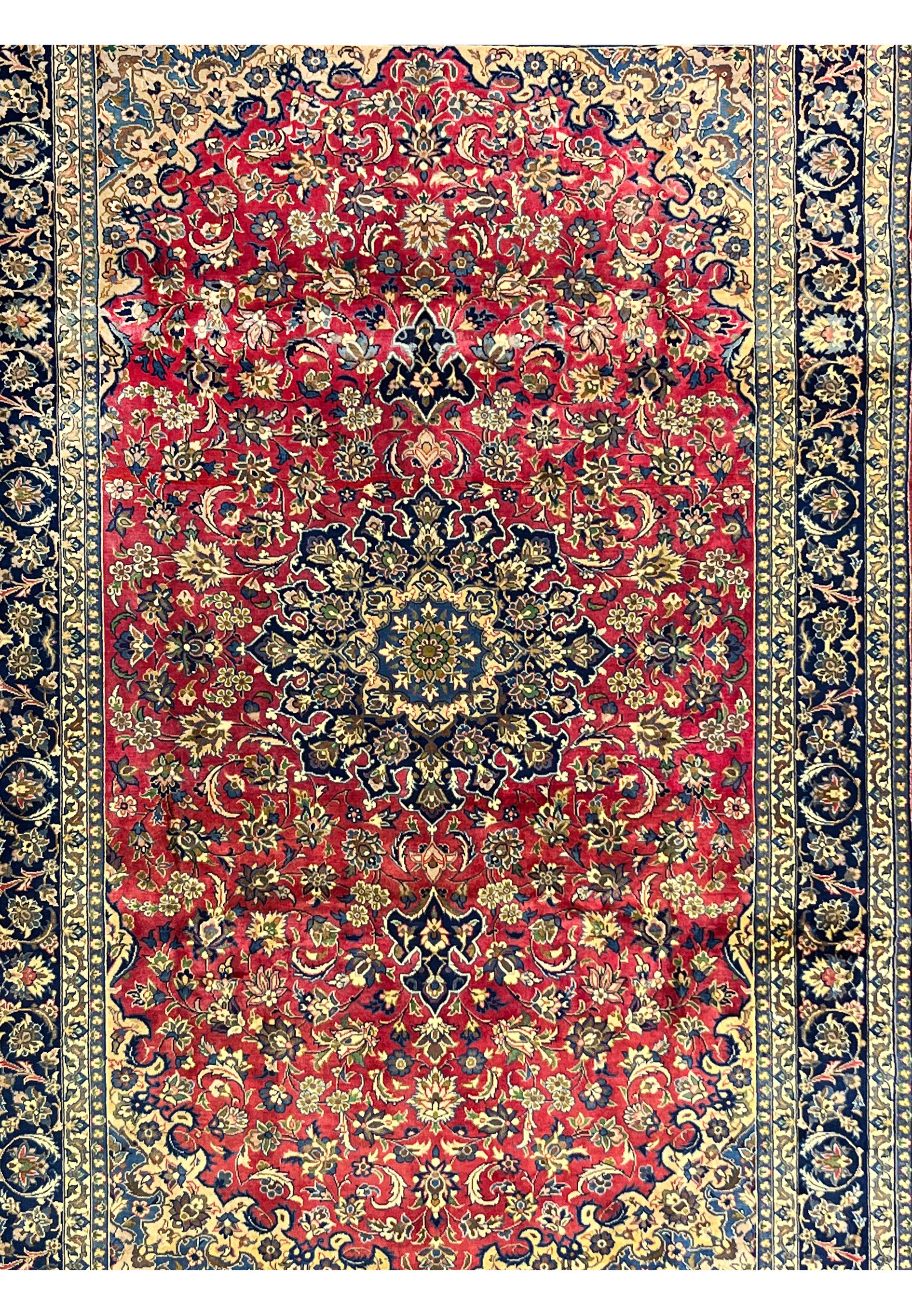 Midfield section of the Isfahan Rug showing the floral patterns and delicate vine motifs woven in wool with aged patina.