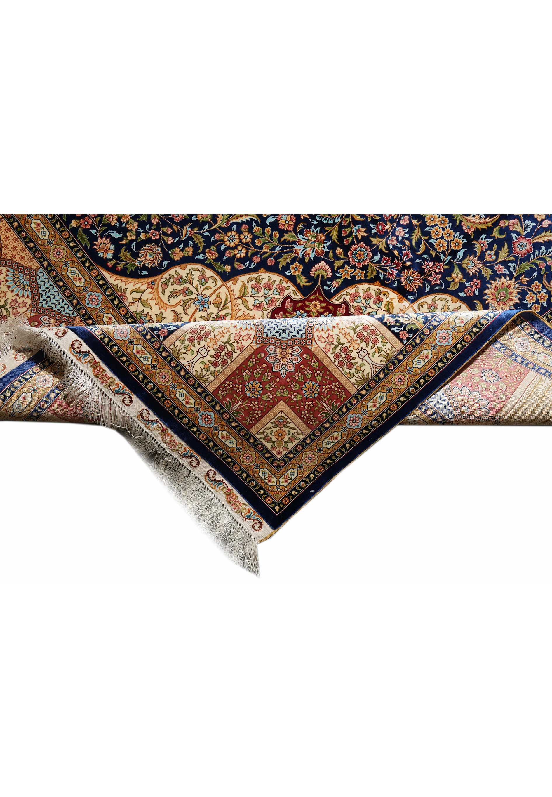 Corner and fringe close-up showing the neat finishing, fine border lines, and silk tassels.