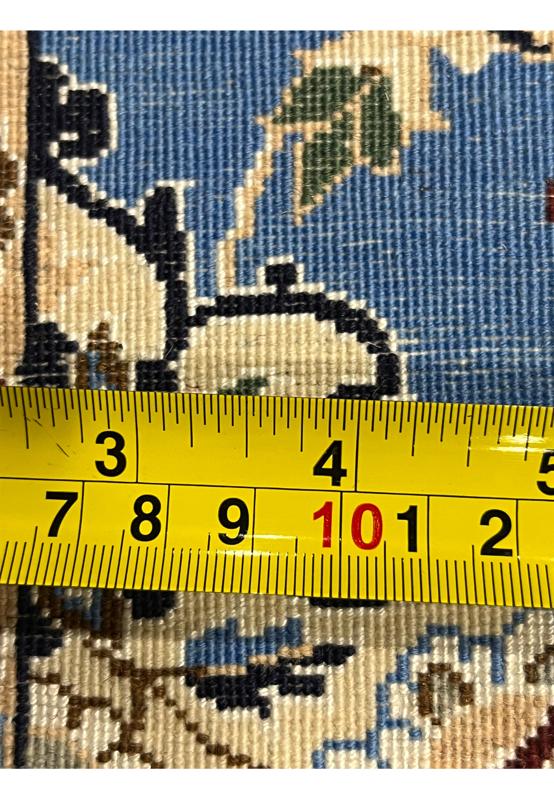Back view of 2'8 x 17'2 Persian Nain 6LA Runner with ruler measuring fine hand-knotted weave on cotton foundation.