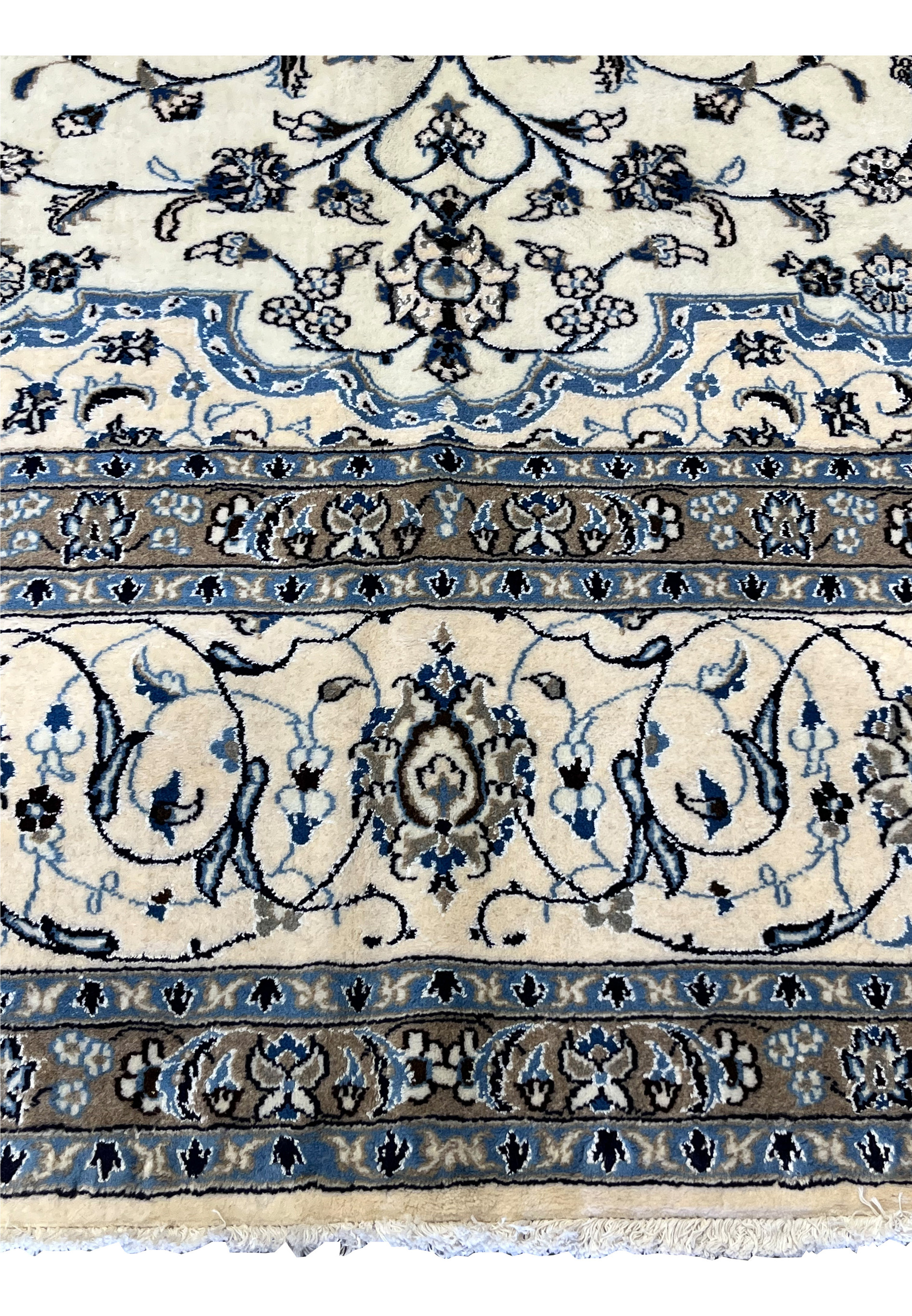 Ivory field and light-blue floral motifs with taupe borders of 10x13 Persian Nain 9LA Rug showing fine wool & silk weaving detail.
