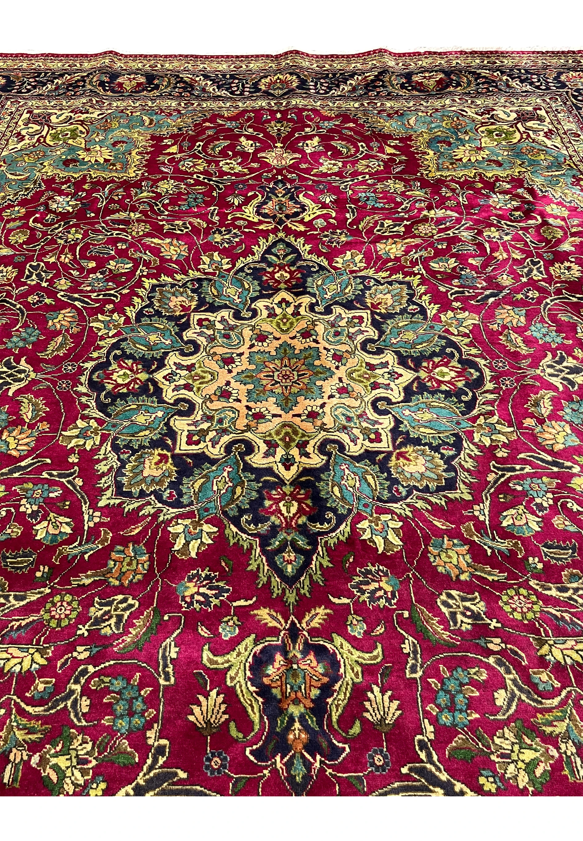 field view highlighting wine red background with interlaced floral vines and botanical motifs