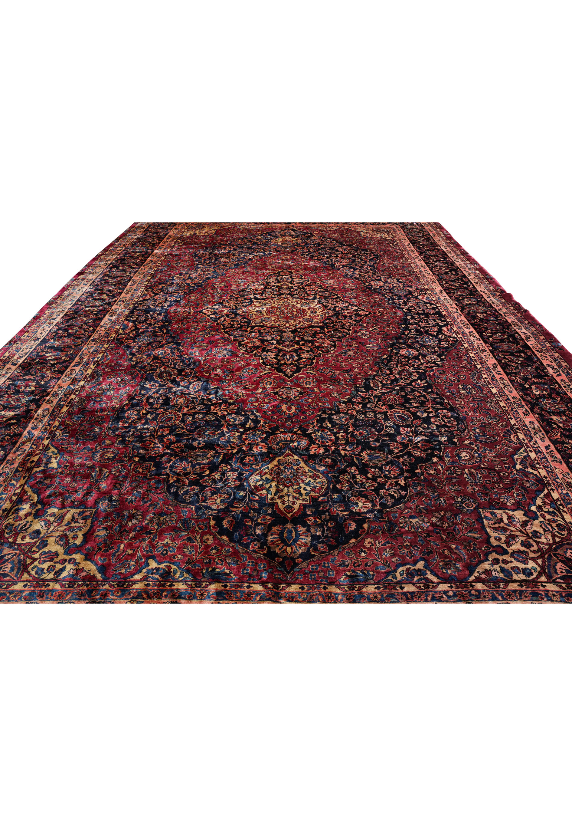Top view of antique Persian Kashan rug highlighting the large central medallion, floral lattice pattern, and contrasting navy borders.