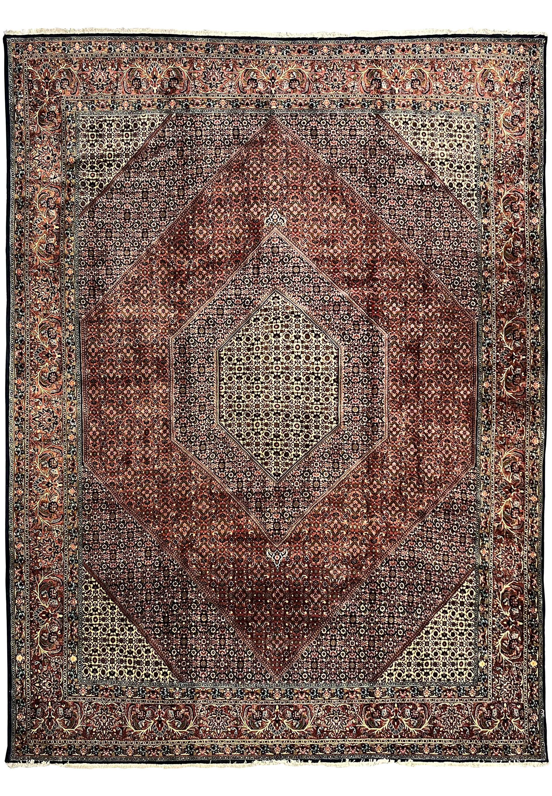 10x13'5 Persian Bijar Iron Rug with hexagonal medallion, brick red field, navy accents, and ivory corner designs.