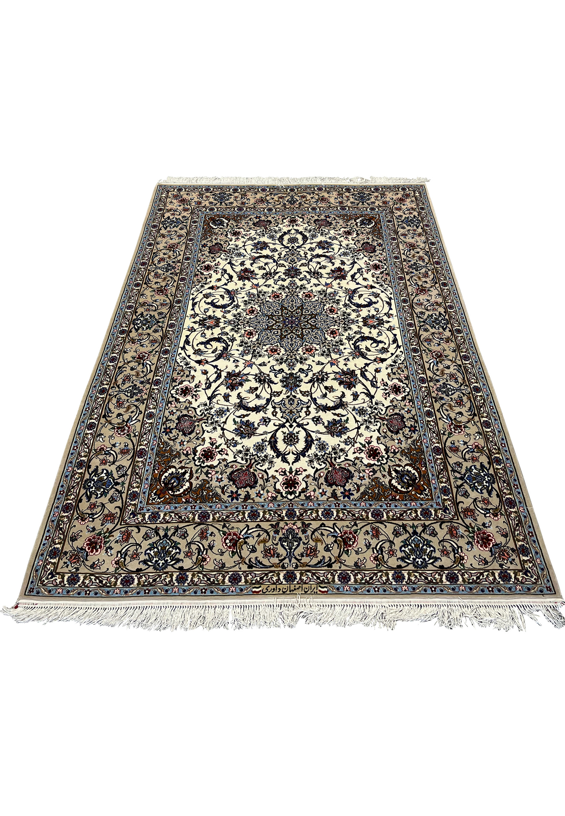 Top view of signed Davari Persian Isfahan rug with ivory field, navy medallion, and detailed wool and silk floral motifs.