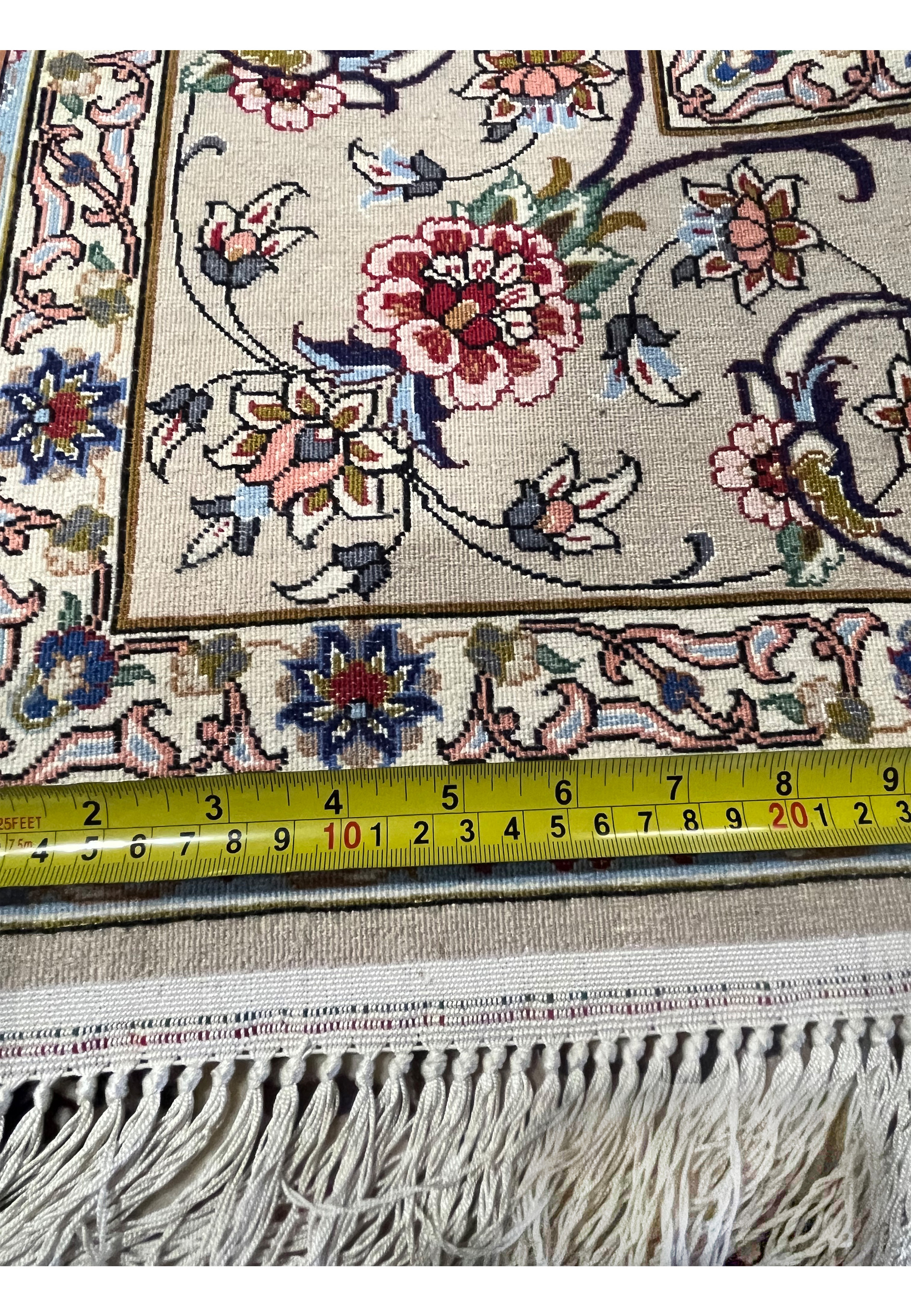 Detailed backside view displaying knot density, floral outlines, and precise craftsmanship of the wool and silk Persian Isfahan rug.