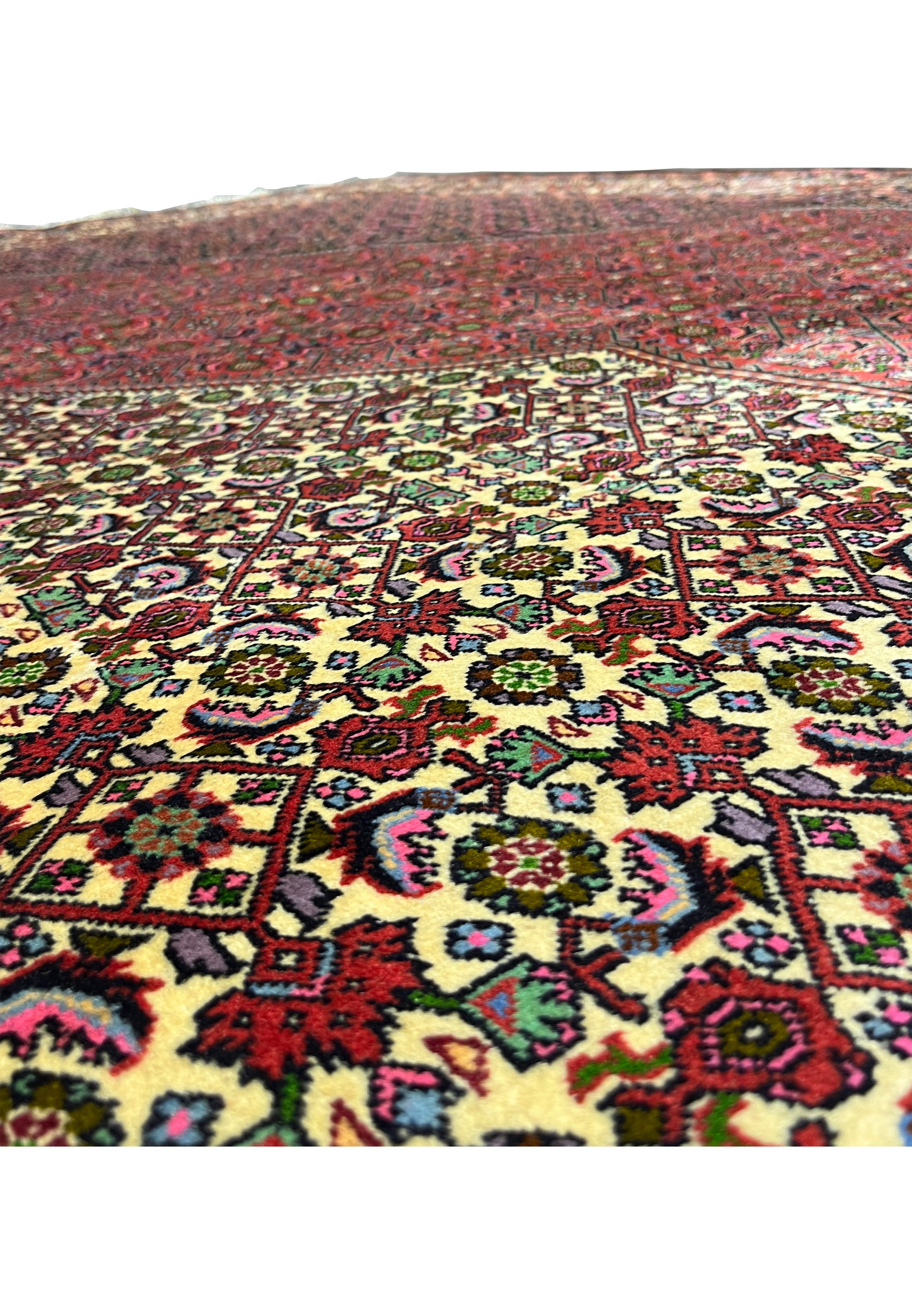 Pattern close up of Persian Bijar iron rug revealing compact floral geometry and bold traditional symmetry