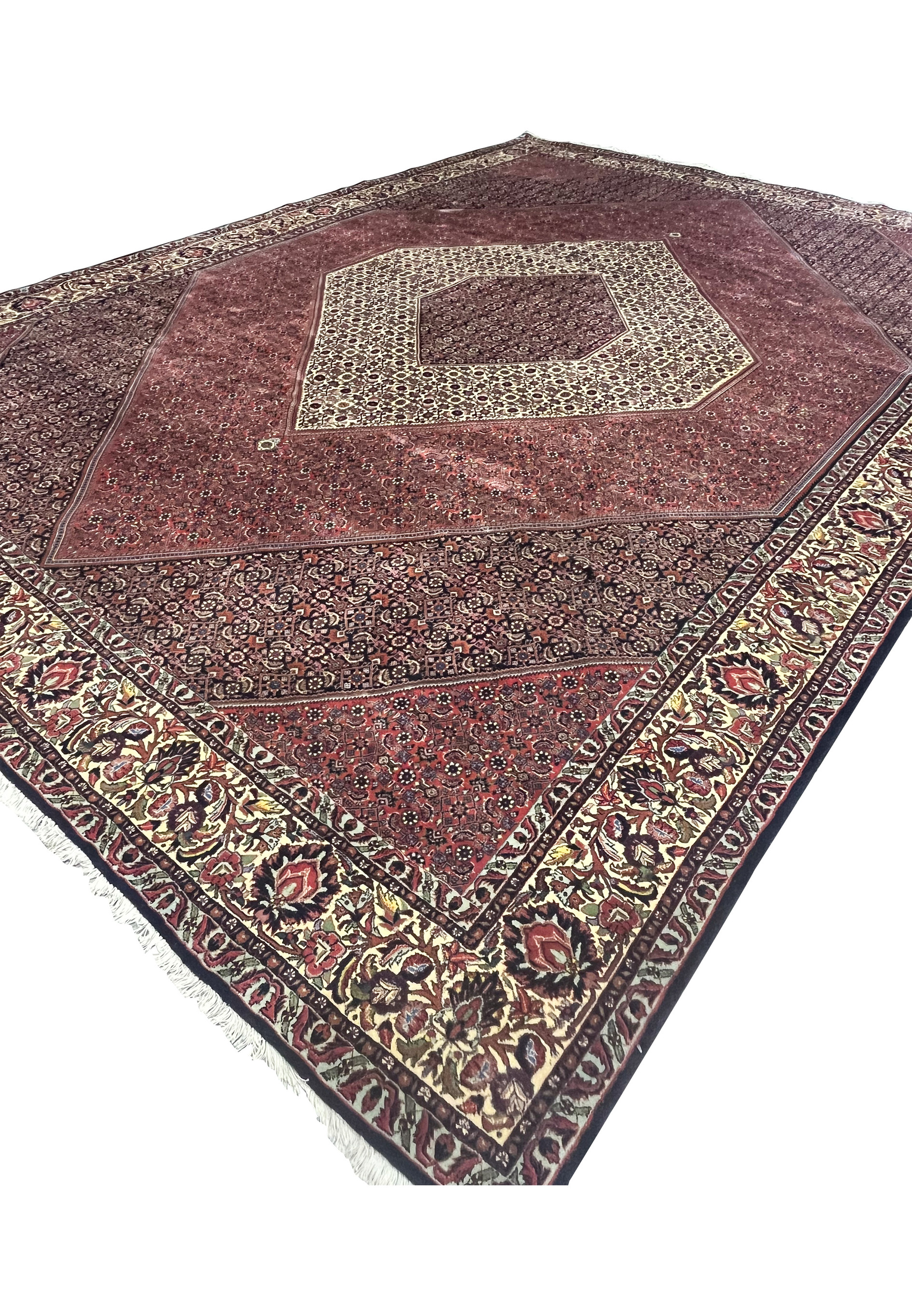Angled perspective of Persian Bijar rug showing thickness and structure