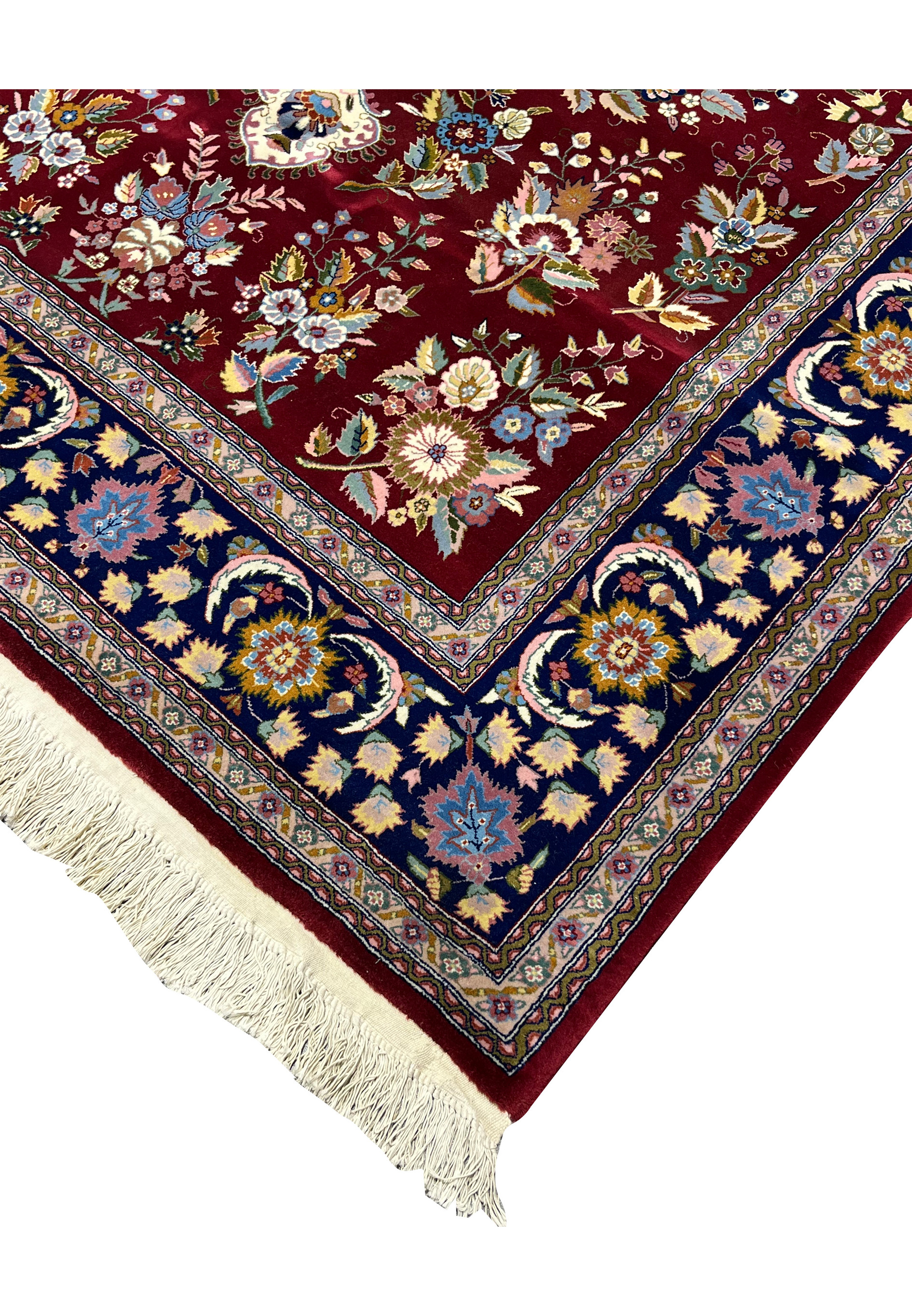 Edge and fringe detail of Persian Isfahan wool and silk rug showing clean finishing