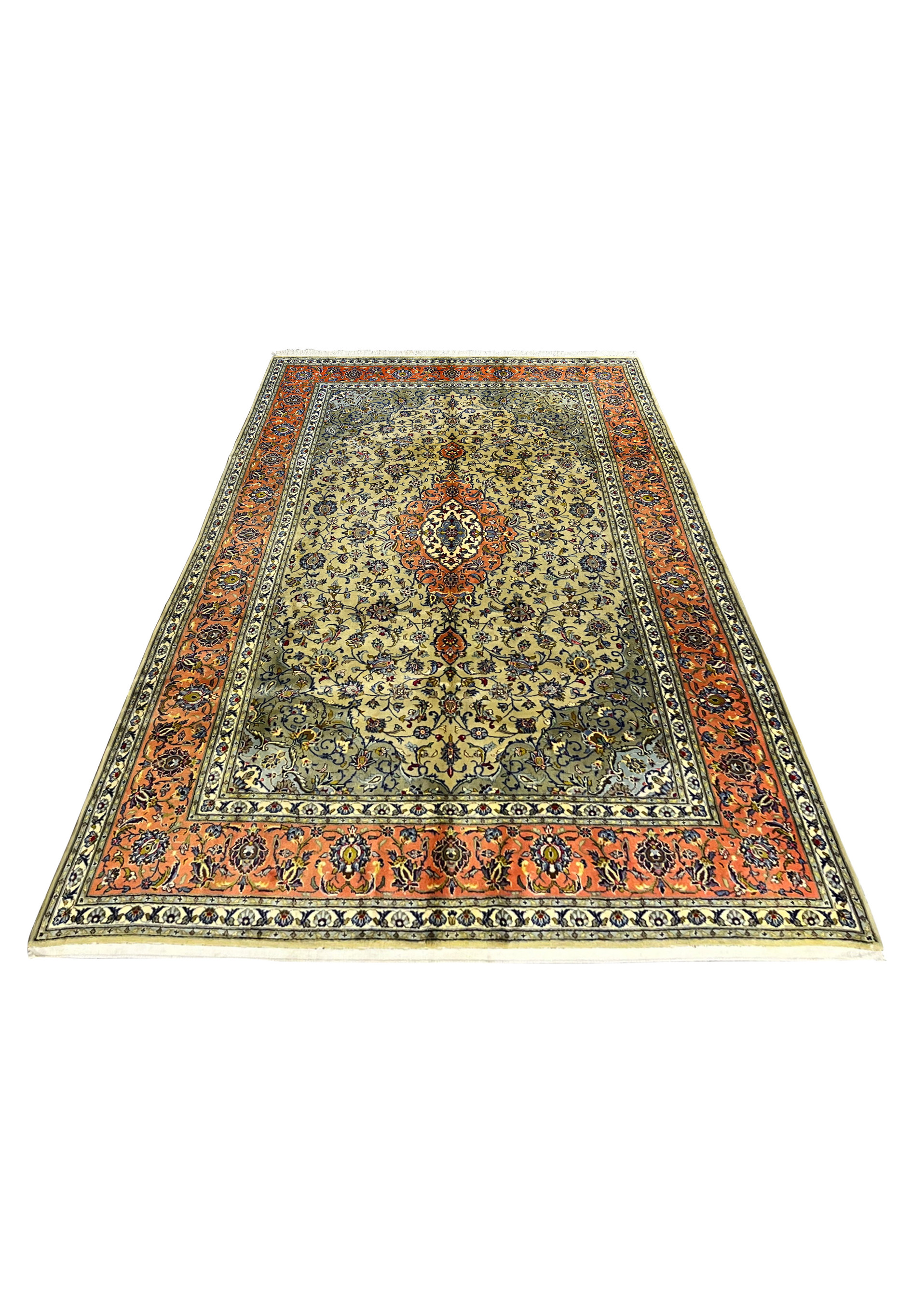 Top view of green Persian Kashan rug showing balanced medallion layout and floral field