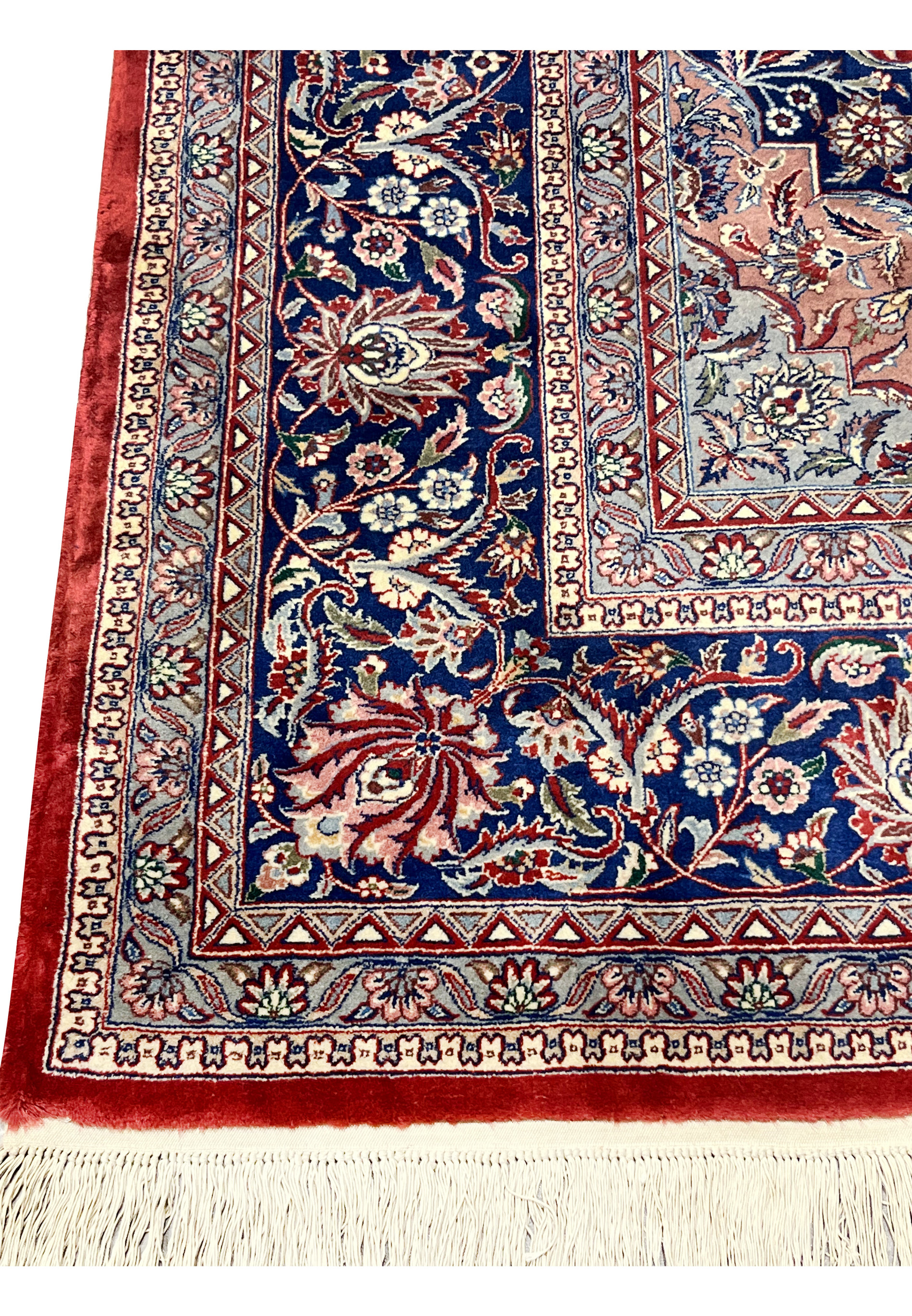 Lower corner detail highlighting wool texture and crisp knot definition