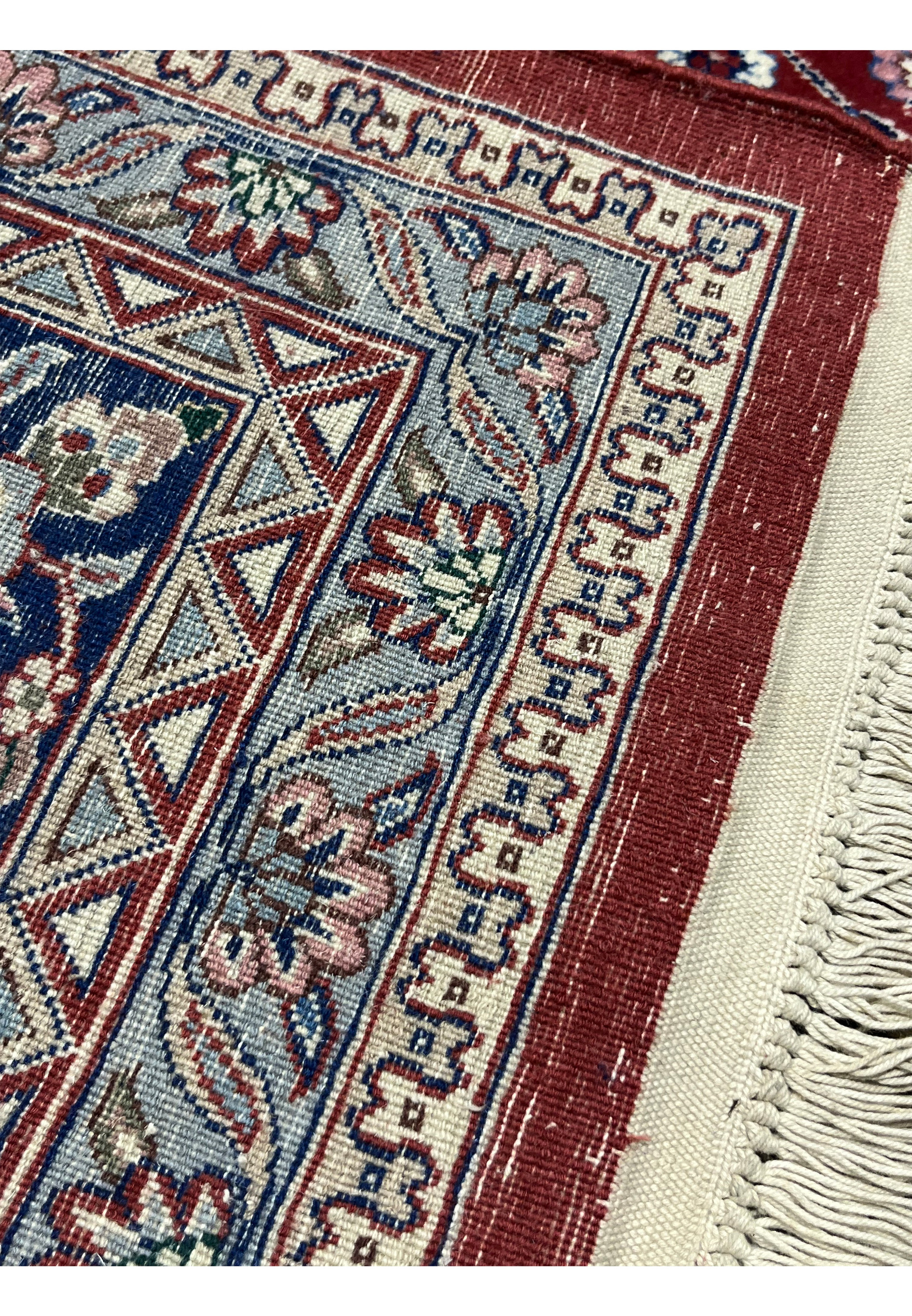 Reverse view of antique Persian Kashan rug revealing uniform knot alignment and clean handwoven construction