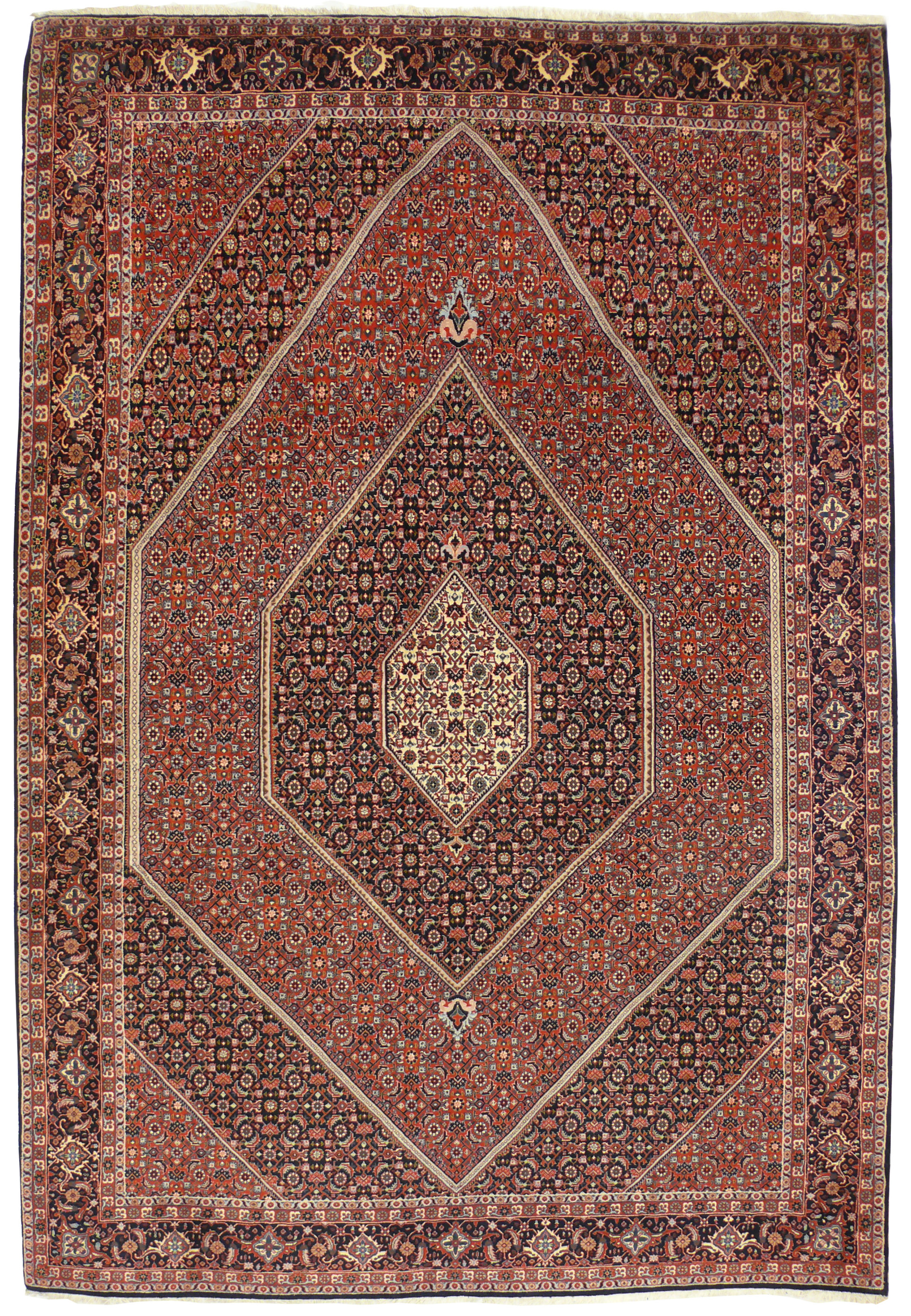 Hand knotted 6'8 x 10'4 Bijar Persian iron rug with red geometric medallion and dark navy border shown flat on white background