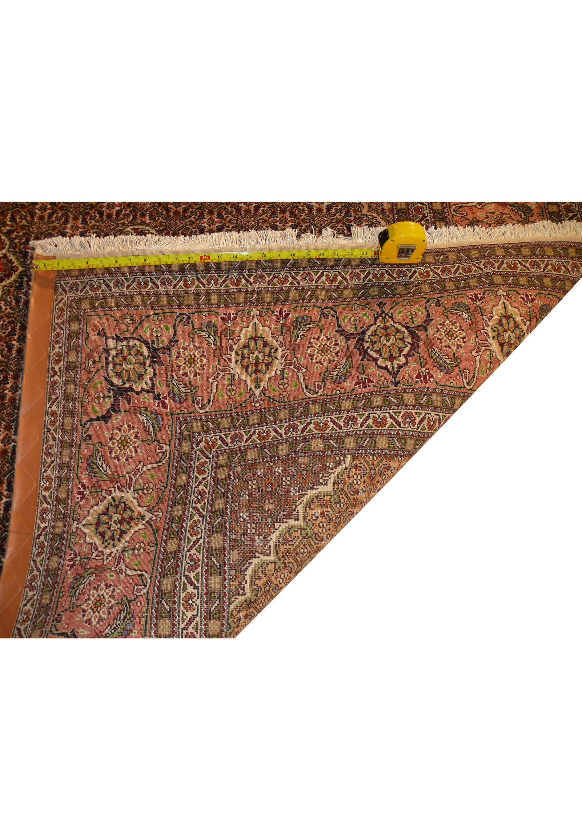 Backside measurement view of 6'6 x 10 Persian Tabriz Mahi rug showing scale and weave