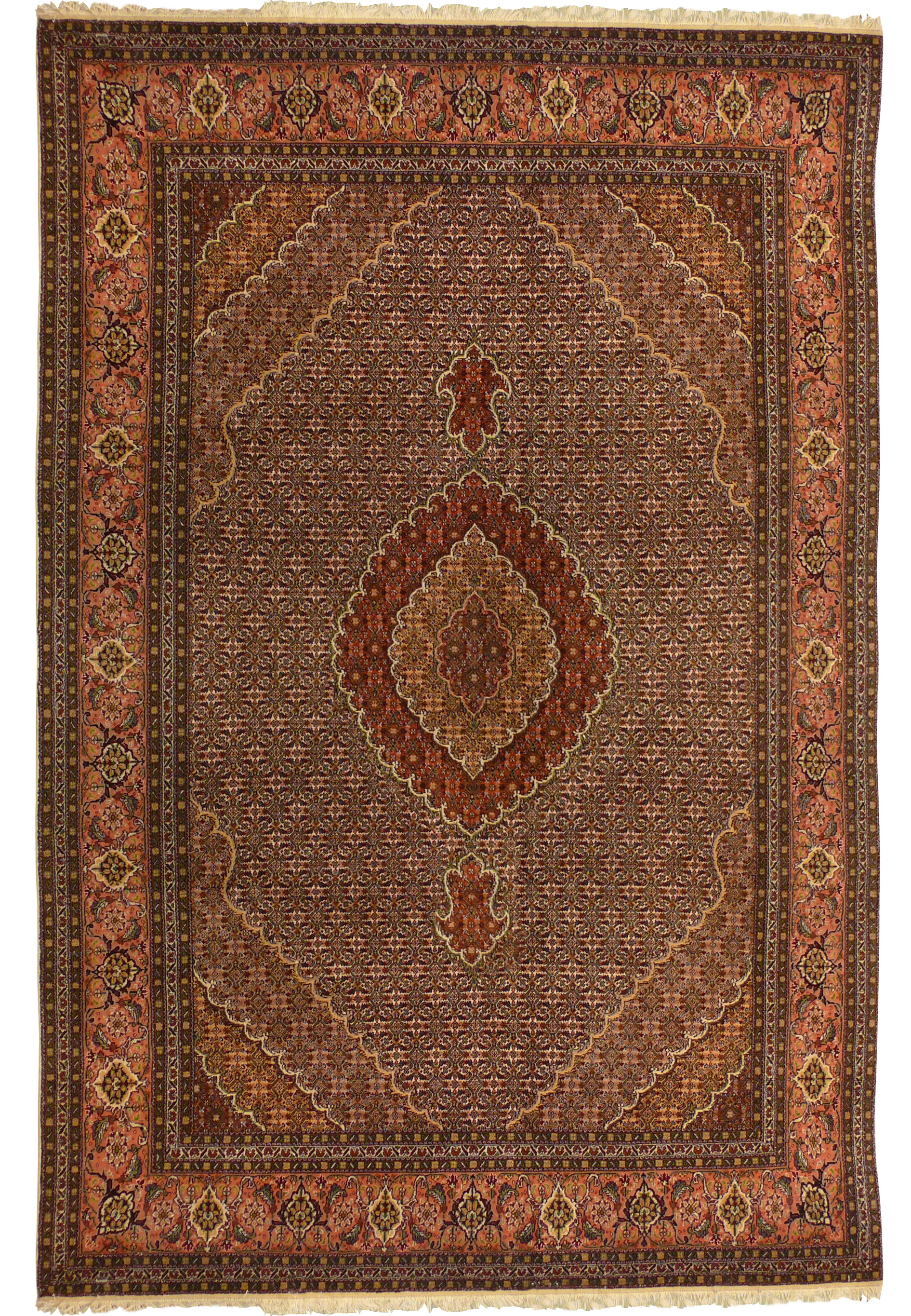 Full view of 6'6 x 10 Persian Tabriz Mahi rug with allover Herati design and earth tone palette