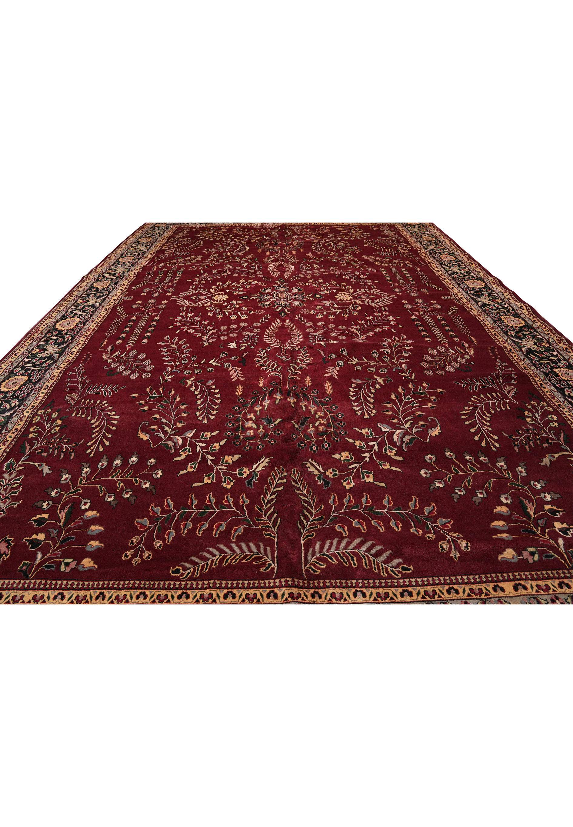 Top view of oversized Sarough rug showing full floral layout