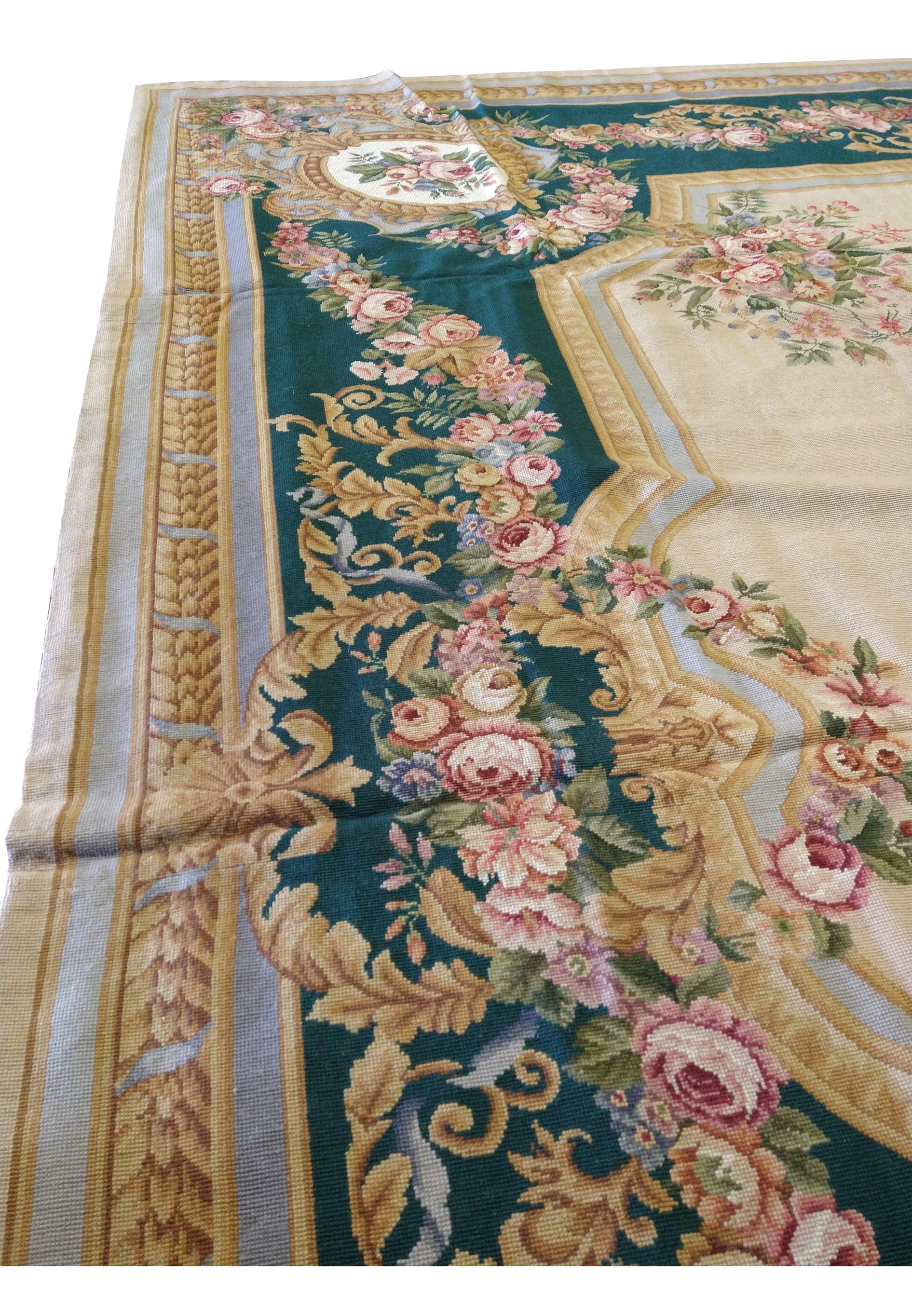 Side angle view of French Aubusson rug emphasizing flatwoven construction, floral border depth, beige field, and European decorative balance