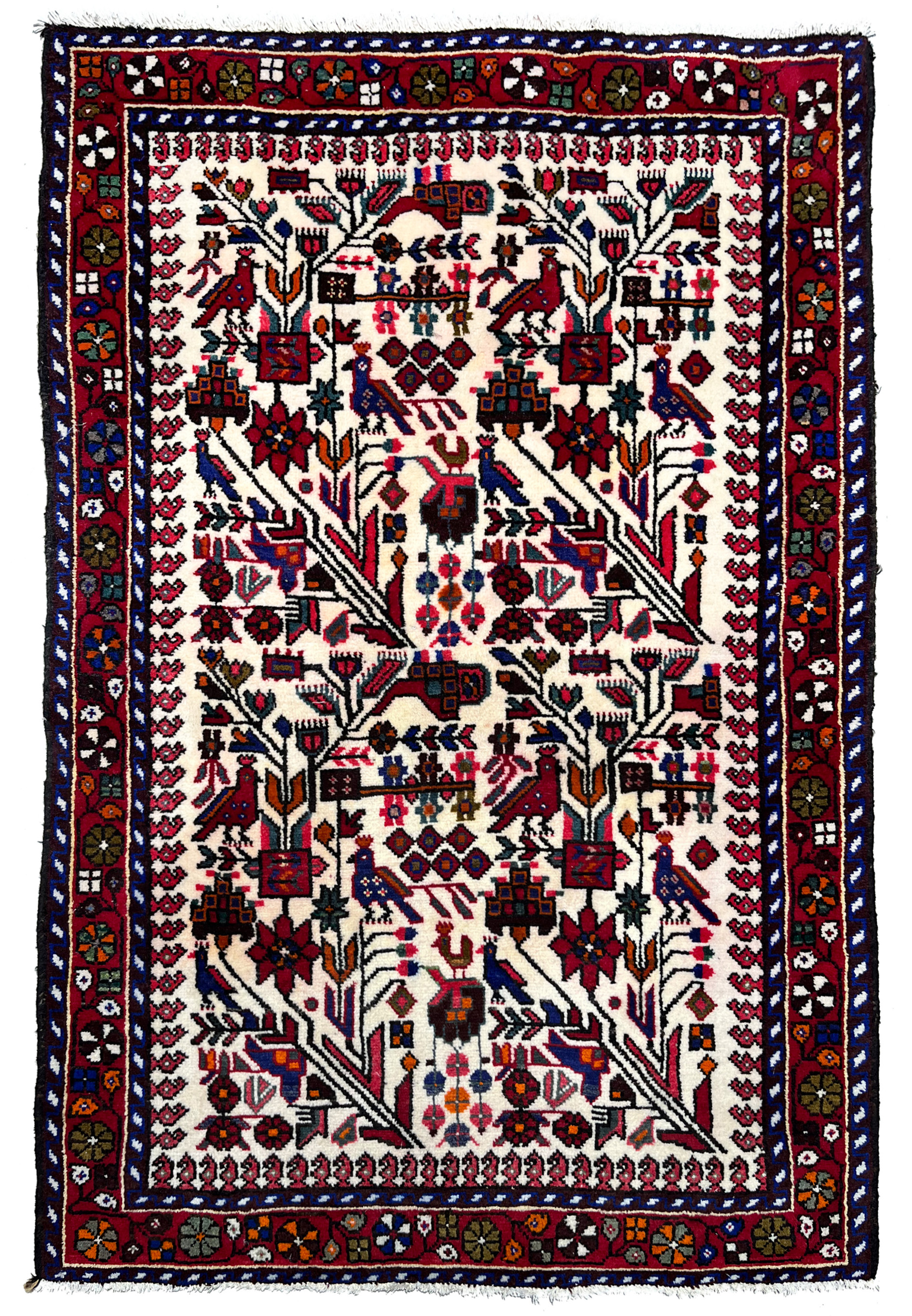 Hand-knotted 3'5 x 5 Persian Rudbar village rug with allover tree and bird design, ivory field, deep red border, and rich tribal wool craftsmanship.