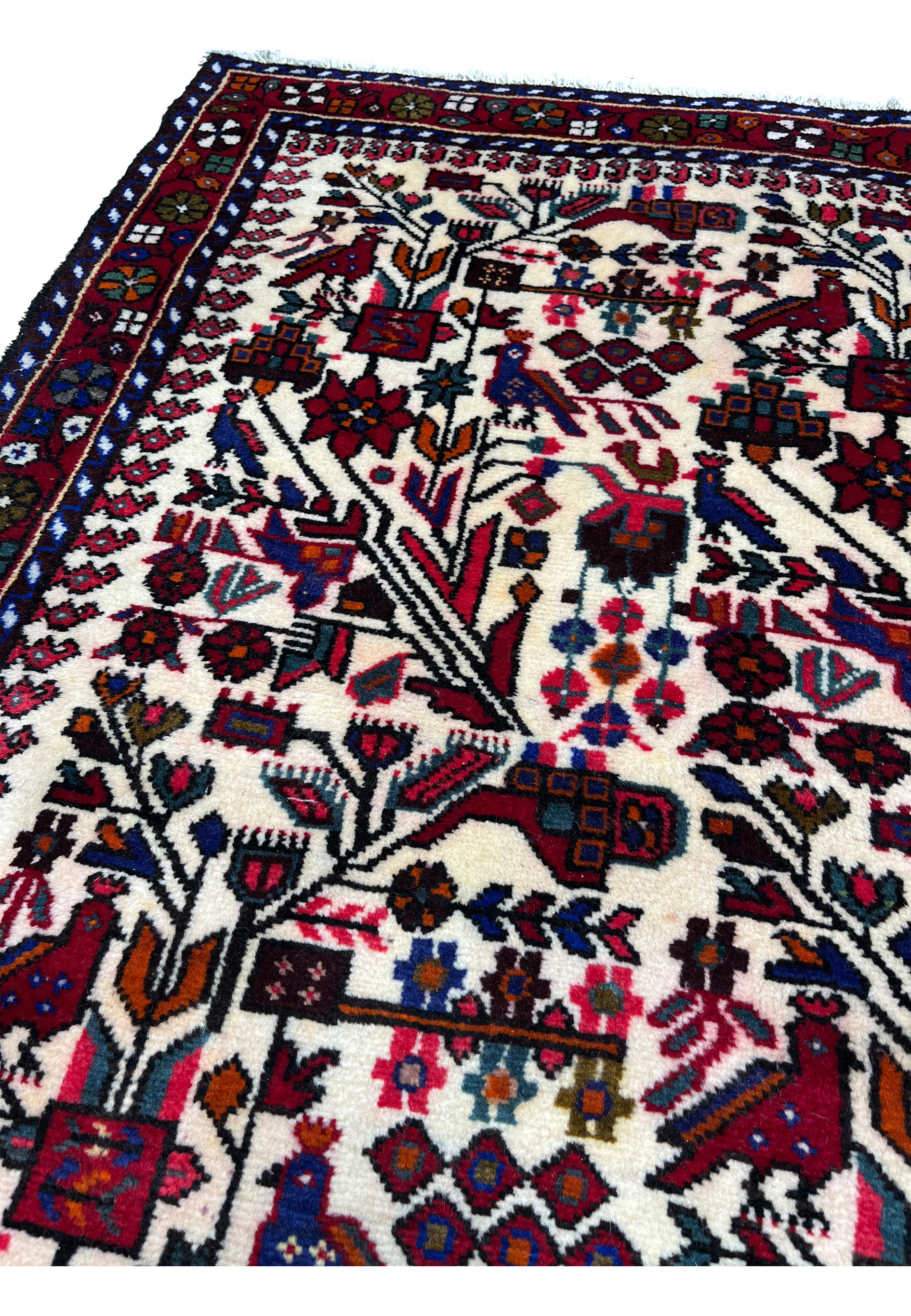 Backside view of hand-knotted Persian Rudbar village rug showing tight wool knotting, strong structure, and authentic rural weaving technique.