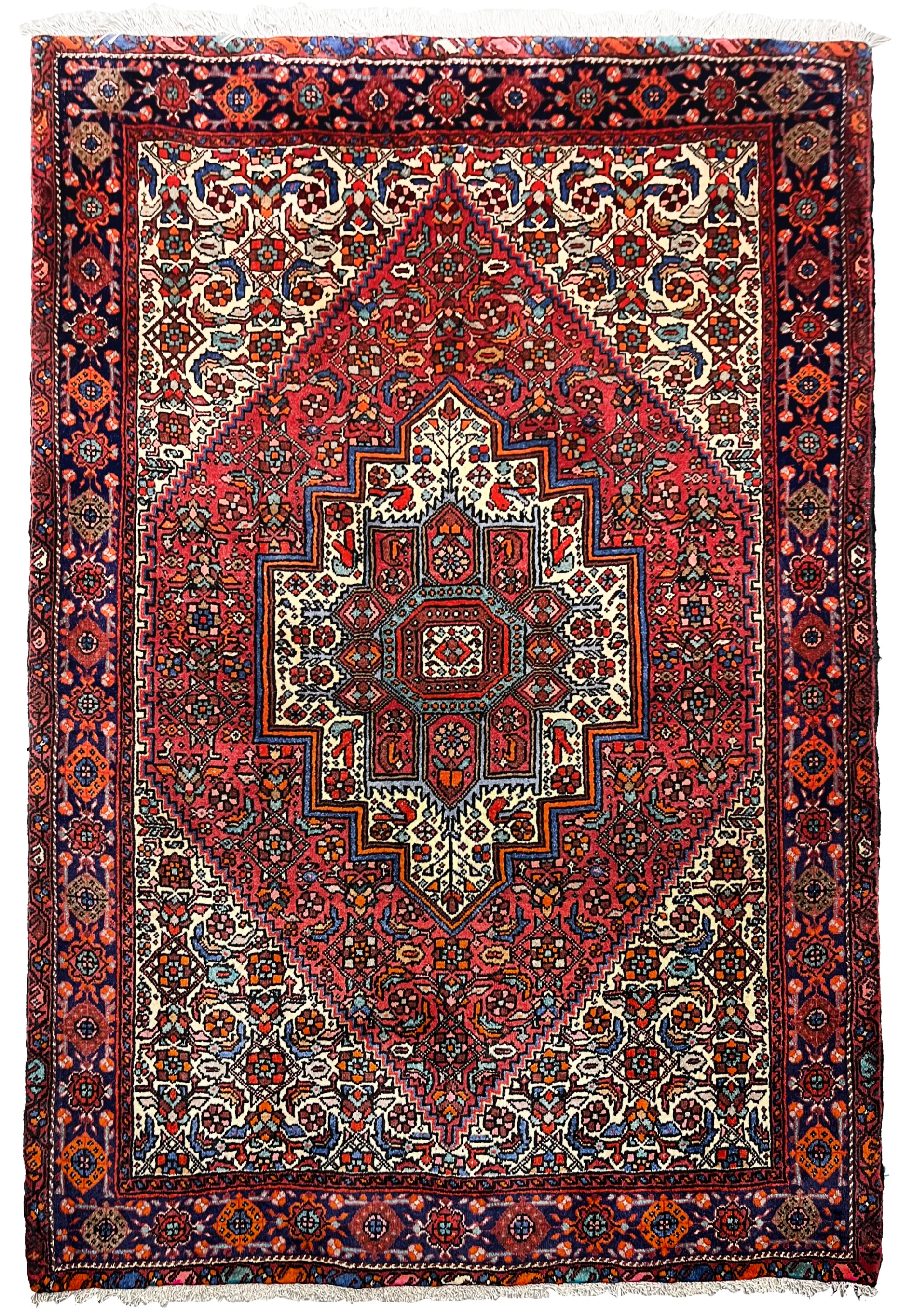 Hand-knotted 3'4 x 4'9 Persian Gholtogh rug shown in full view with bold geometric medallion, deep red field, ivory accents, and richly patterned navy borders