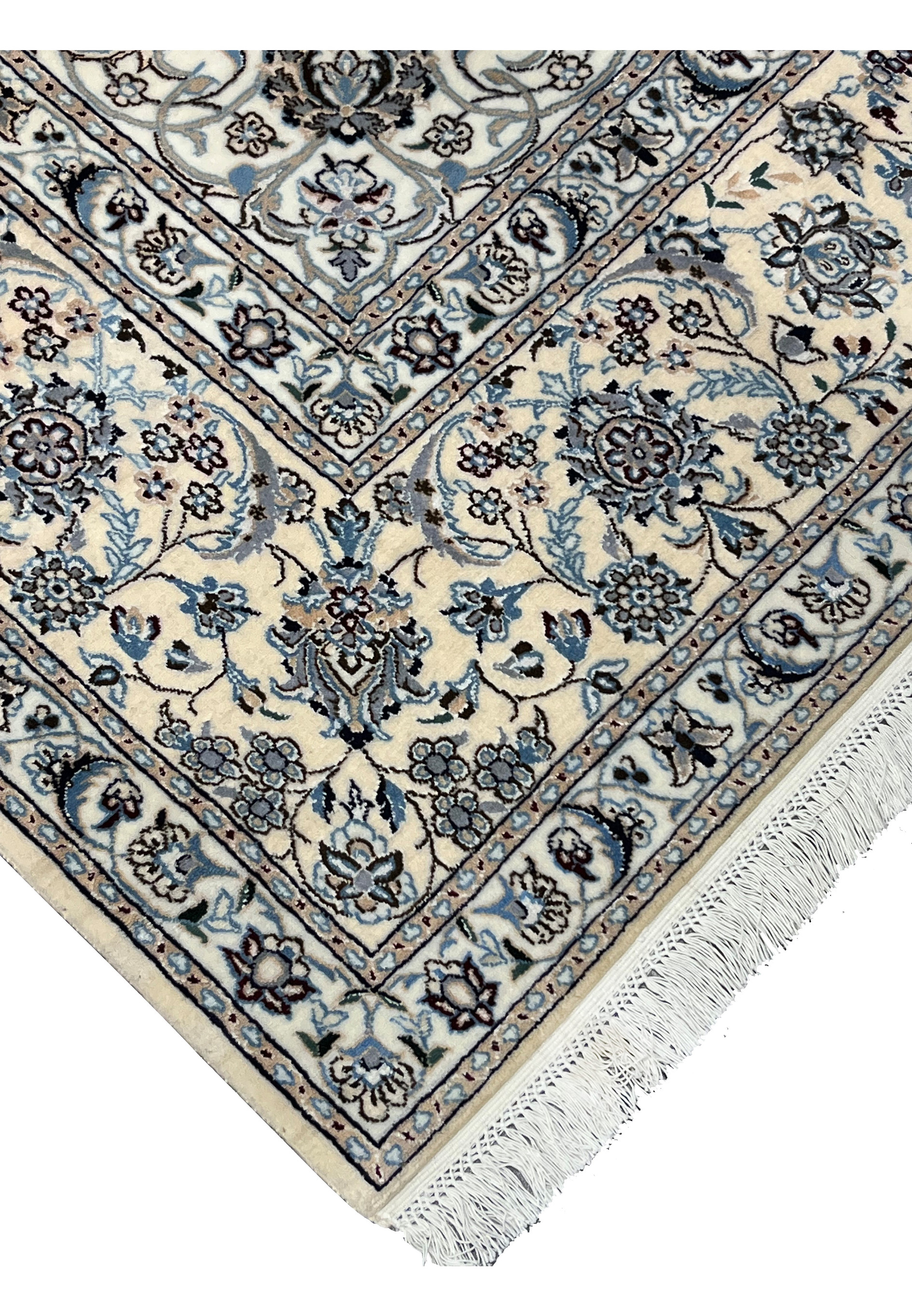 Edge and fringe detail of Persian Nain Habibian silk rug showing clean finishing, silk foundation, and even knot alignment