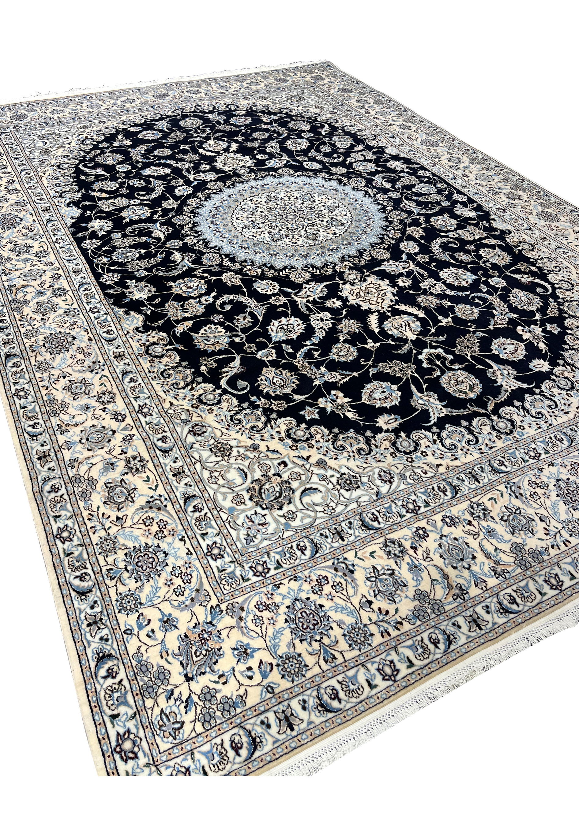 Perspective view of Persian Nain Habibian signed silk rug emphasizing depth, structure, and luminous silk pattern clarity