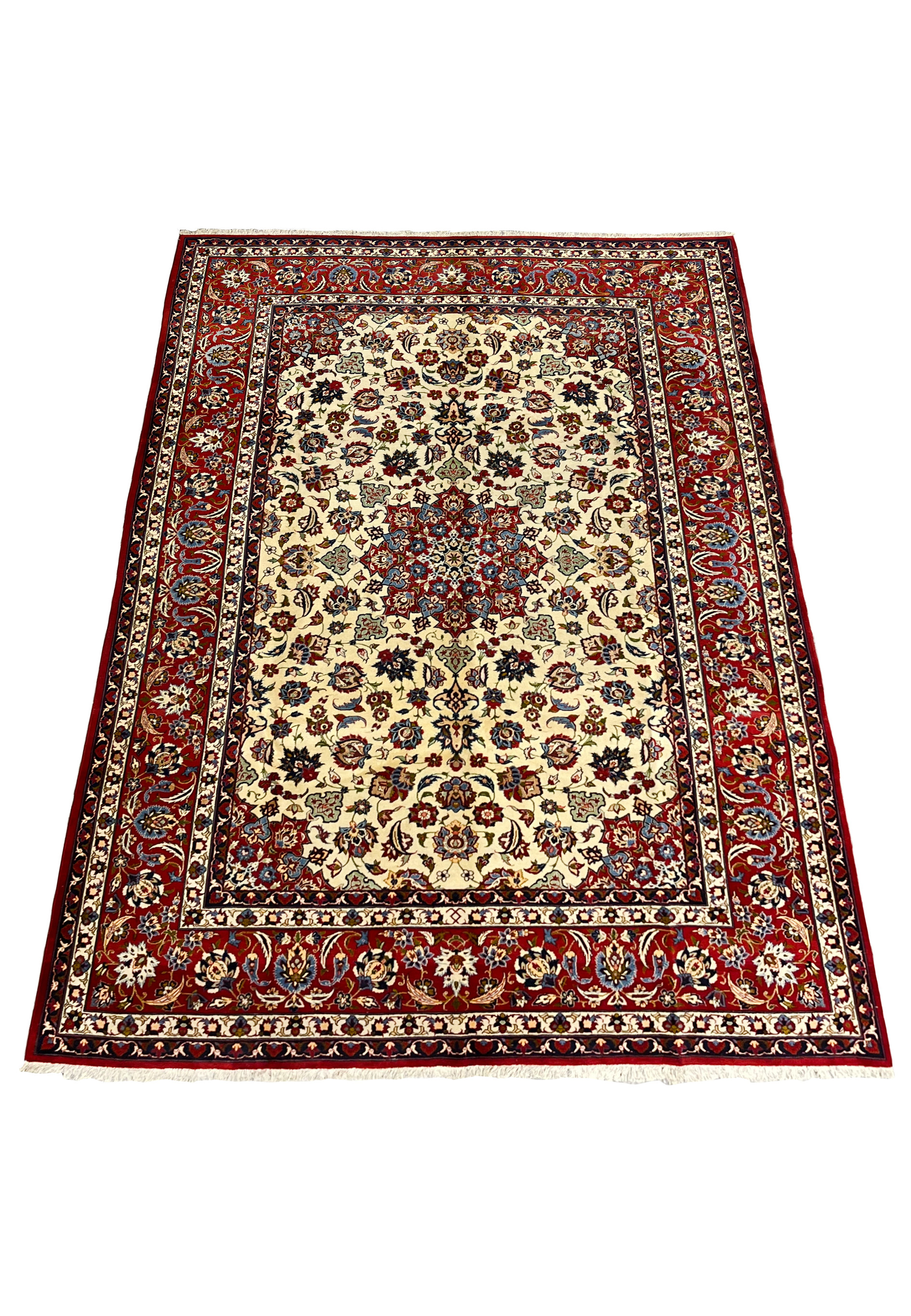Laid-down perspective of an 8.8 x 12.4 handmade Persian Isfahan rug showing balanced proportions, ivory background, red borders, and refined floral symmetry