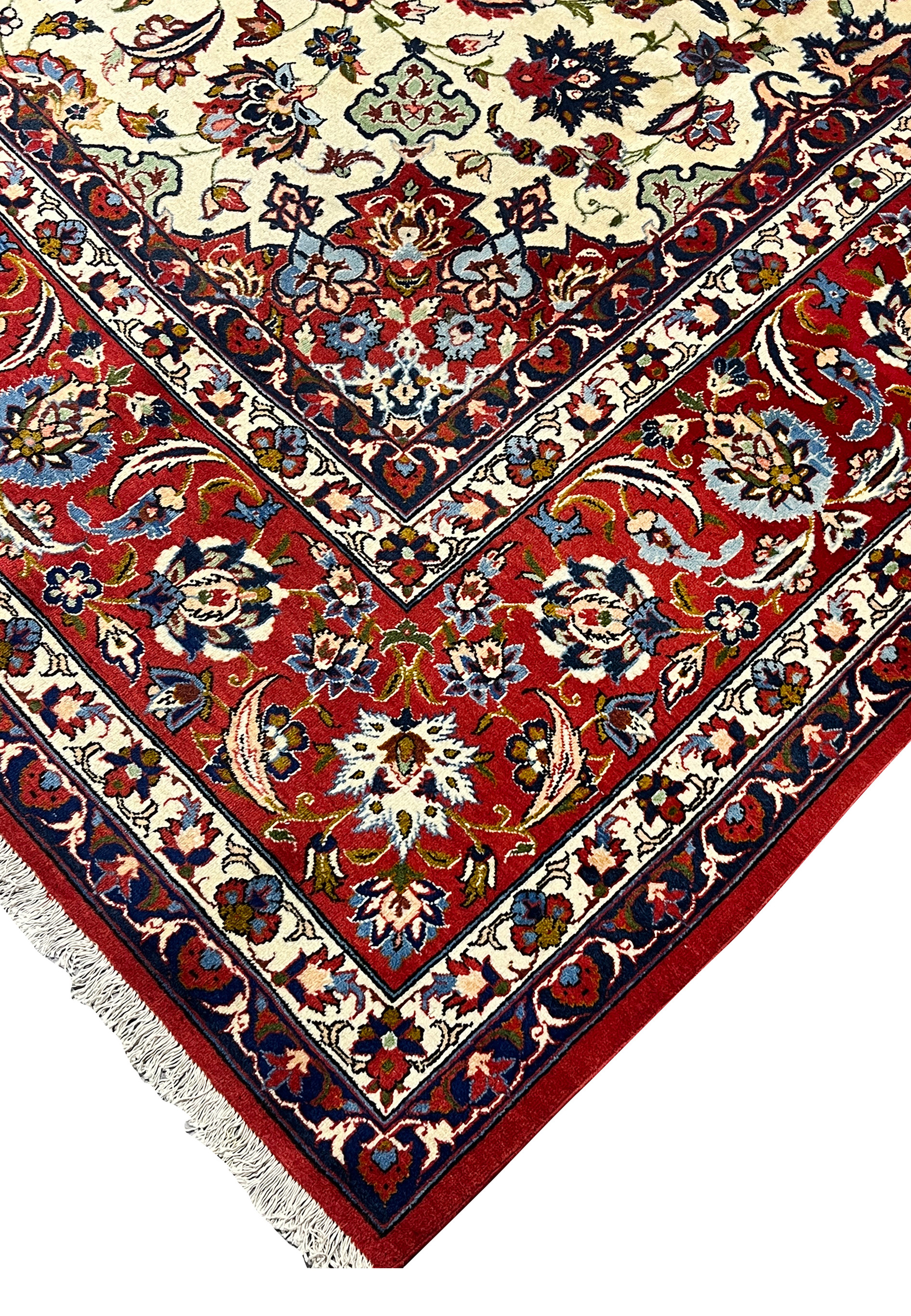 Edge view of a handmade Persian Isfahan rug highlighting even pile height, tight knot structure, and clean transitions between border and field
