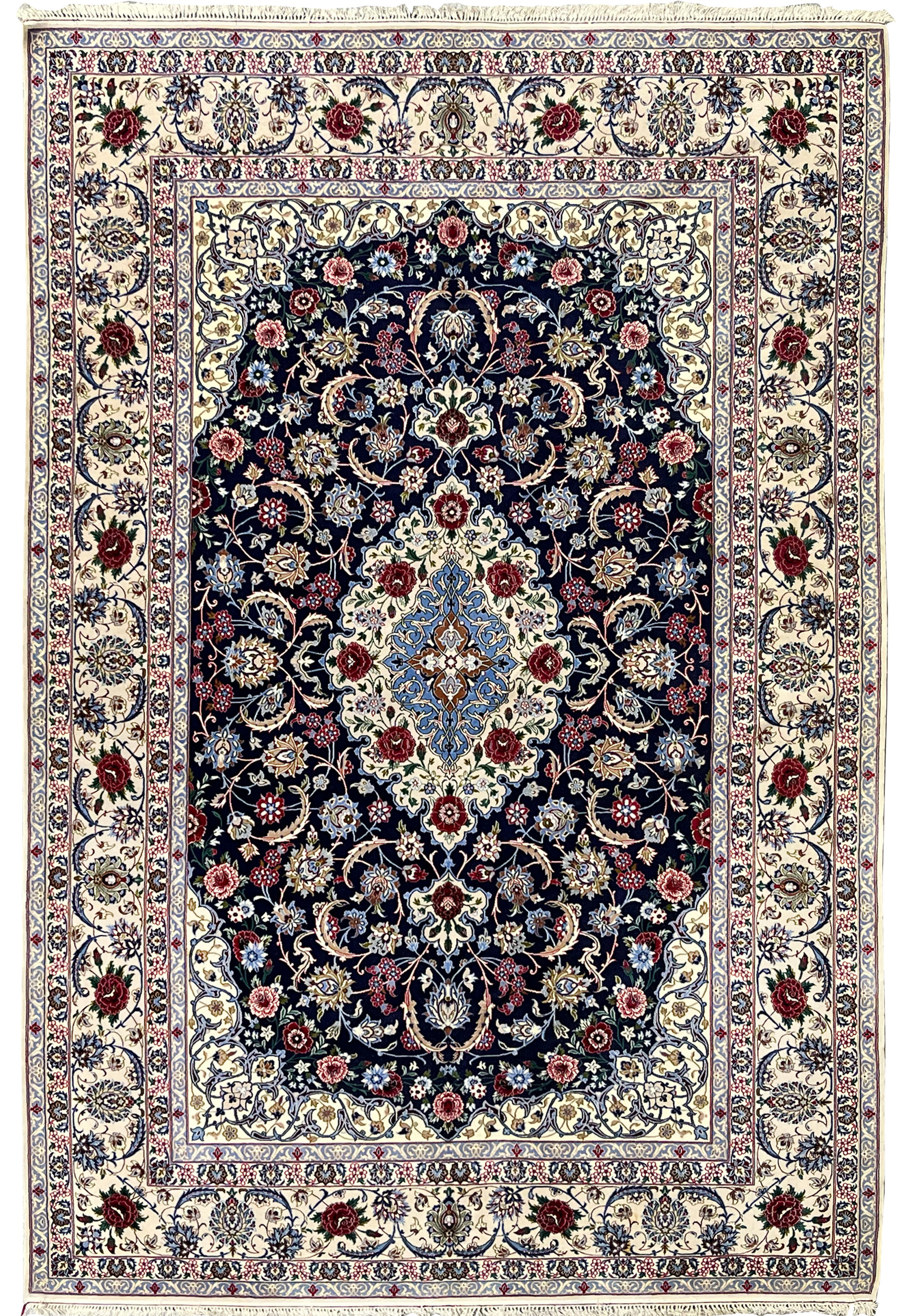 7 x 10 super fine Persian Isfahan wool and silk rug with deep navy field, ivory floral medallion, intricate vine scrolls, and classic multi border design